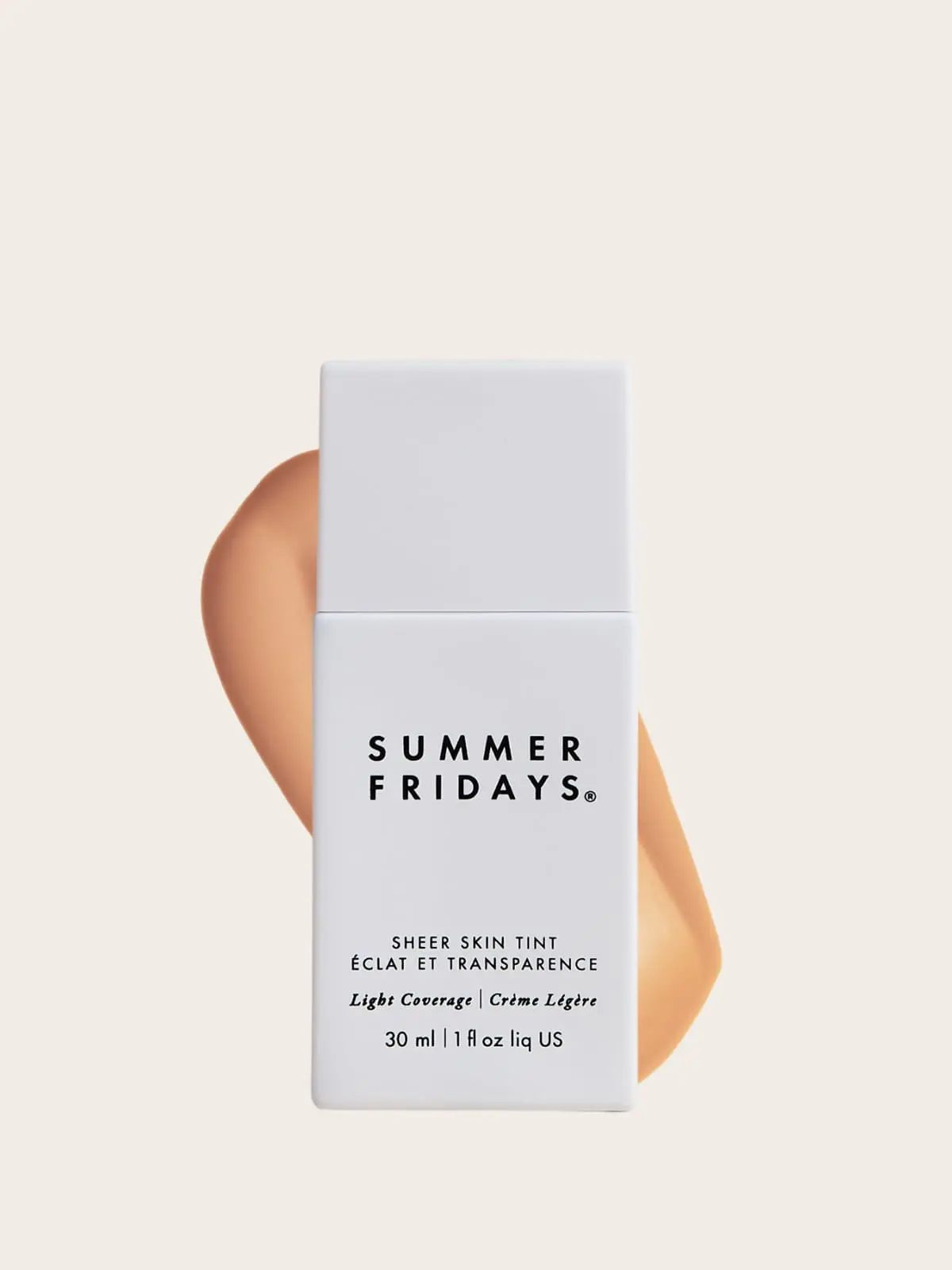 Summer Fridays sheer skin tint in white packaging with skin tone background