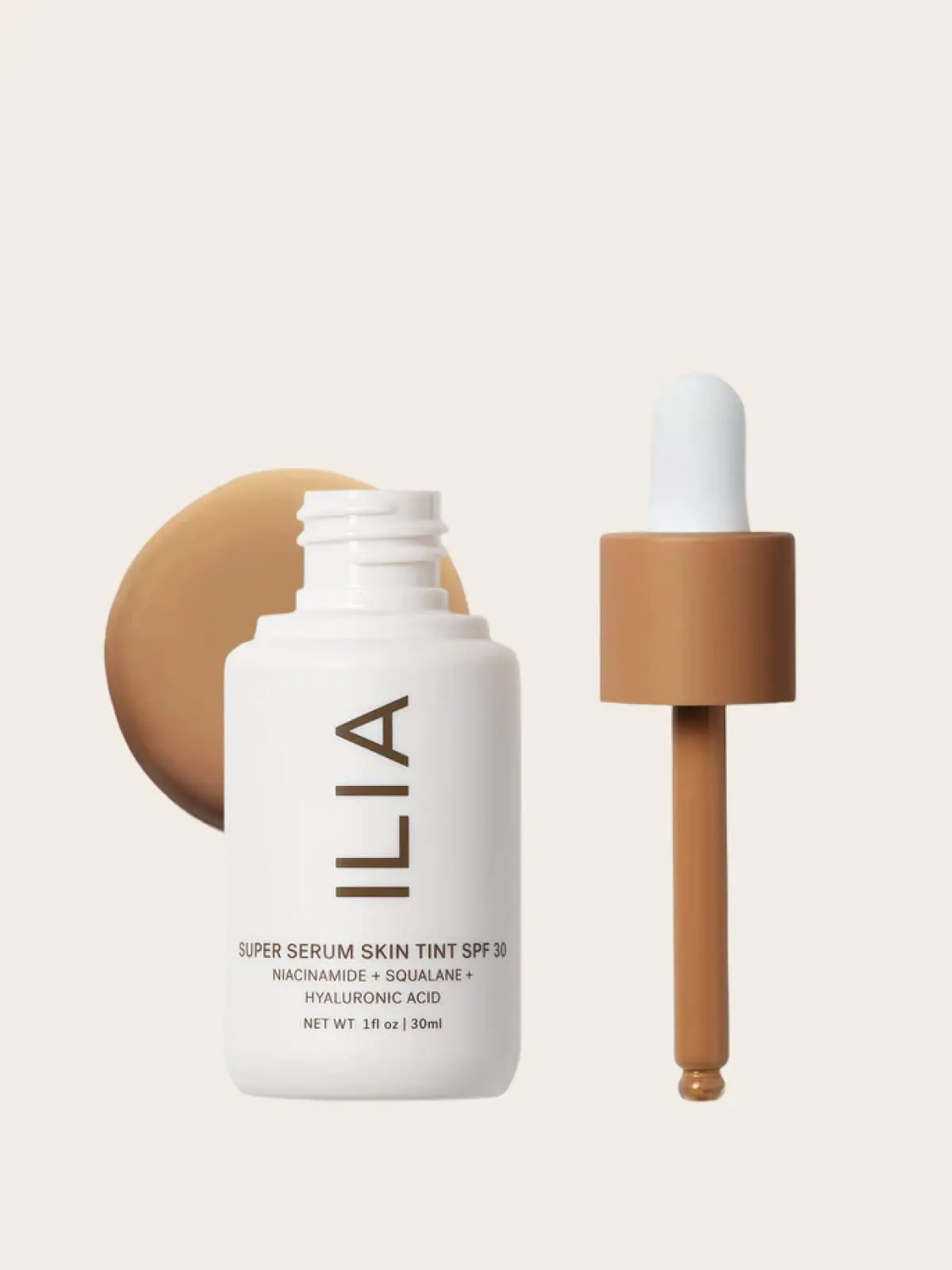 Ilia Super Serum Skin Tint SPF 30 with dropper and bottle