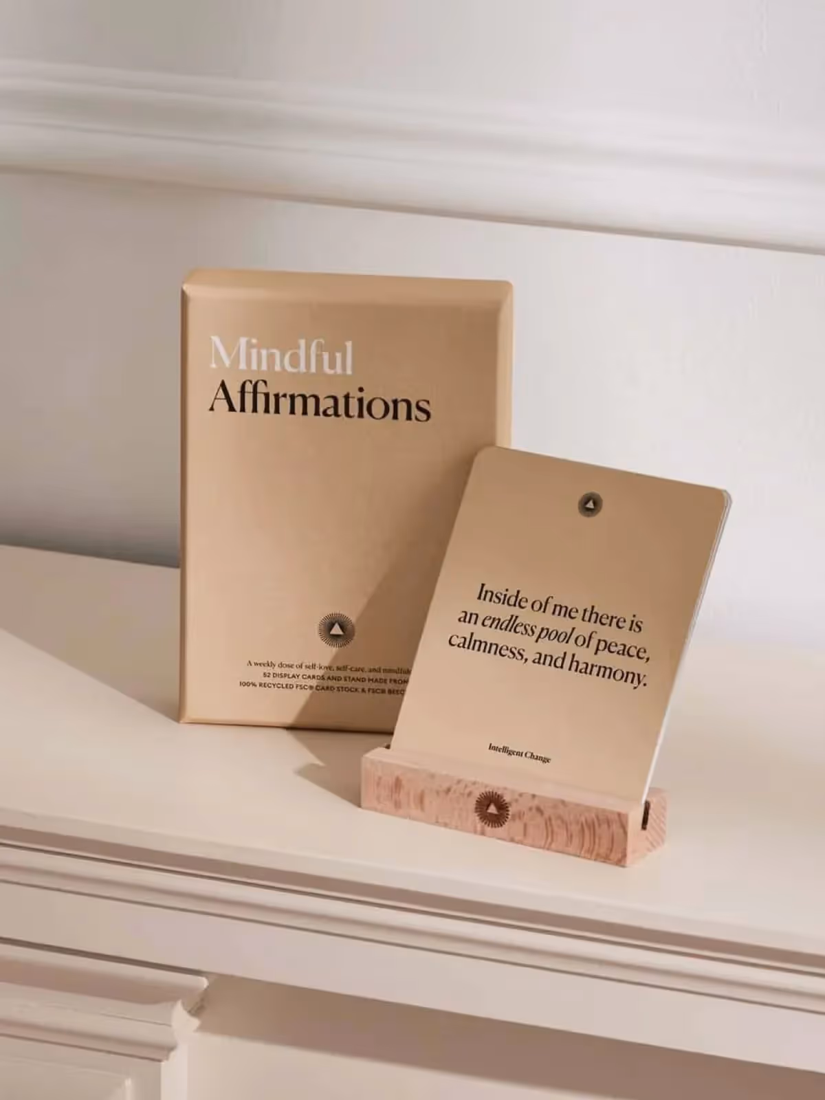 Mindful Affirmations book with peaceful quote on wooden stand