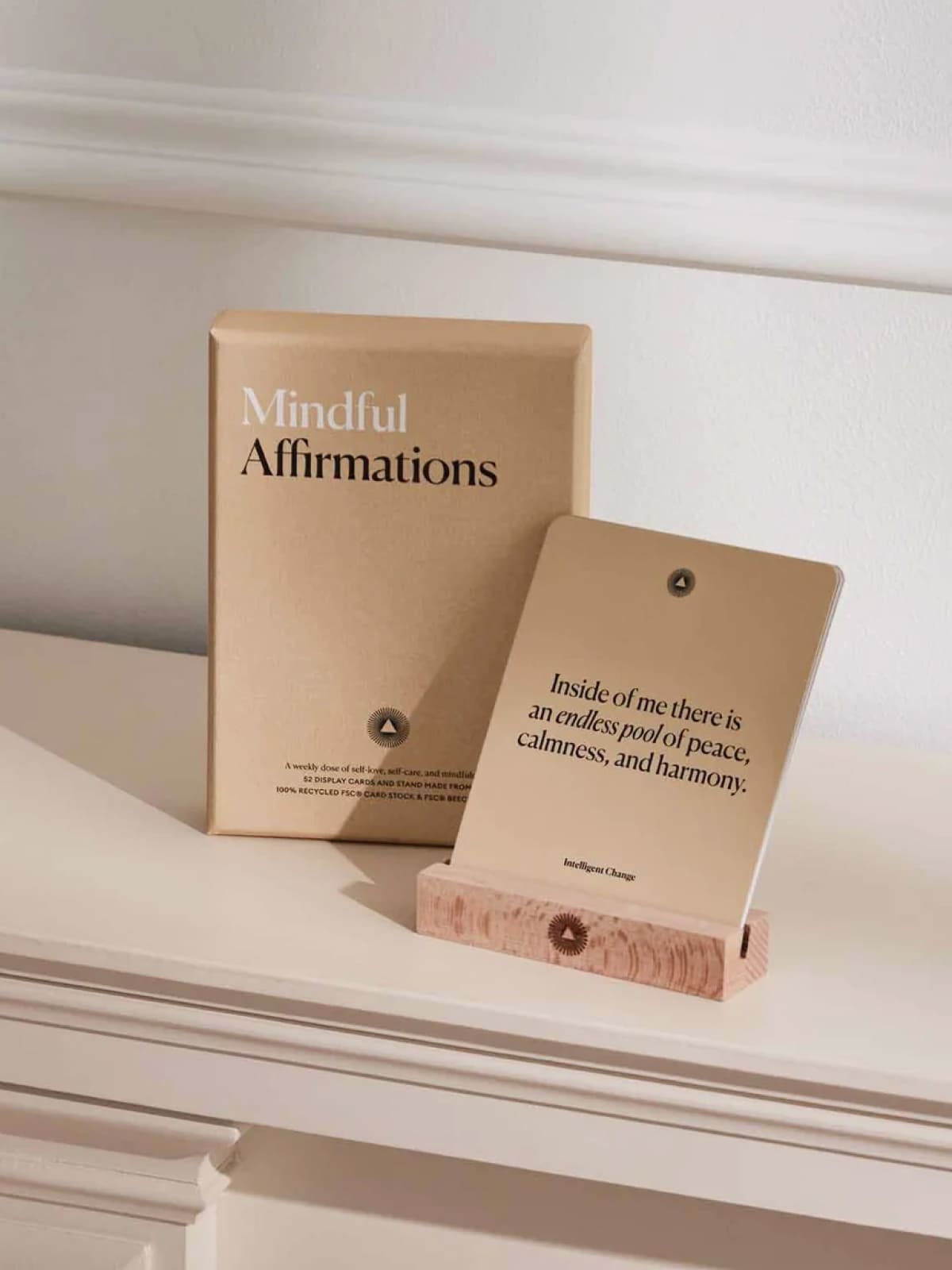 Mindful Affirmations book with peaceful quote on wooden stand