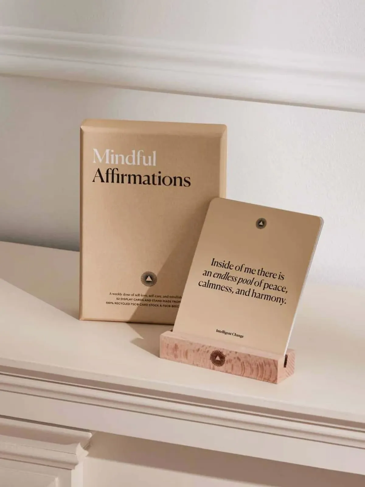 Mindful Affirmations book with peaceful quote on wooden stand