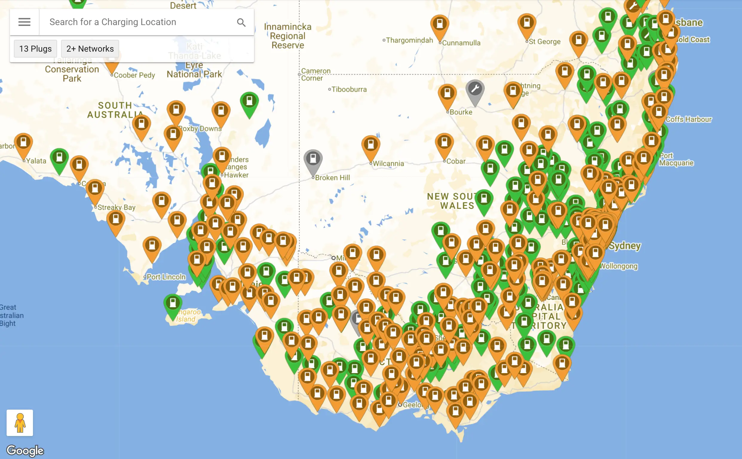 A map of Southeastern Australia from PlugShare showing a high density of electric vehicle charging stations. The icons, colored in green and orange, are heavily clustered along the coastline and major metropolitan areas like Sydney, Melbourne, and Brisbane, while significantly thinning out towards the inland regional areas of New South Wales and South Australia. Sourced by High Demand Electrical.