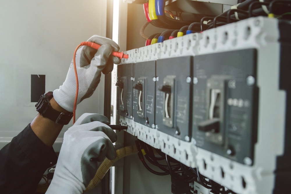 Level 2 electrician planning a commercial electrical fitout in a Sydney office — switchboard and power distribution work