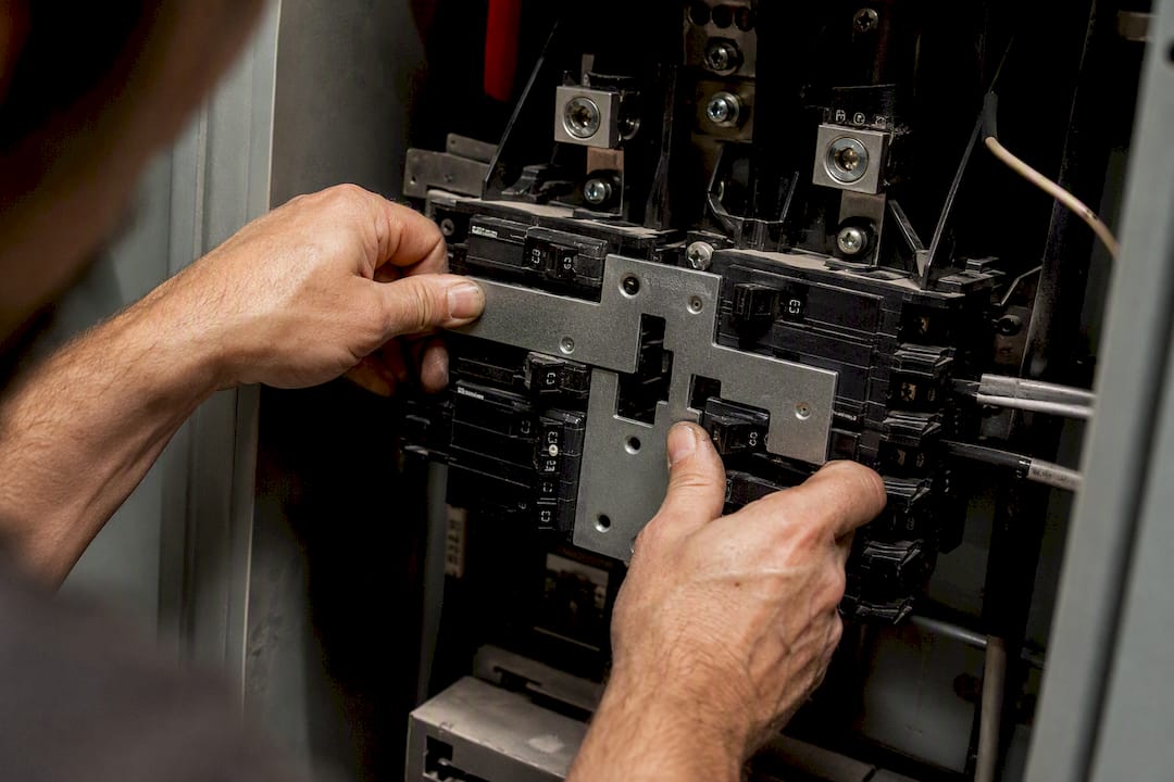 Fitting interlock device on breaker panel