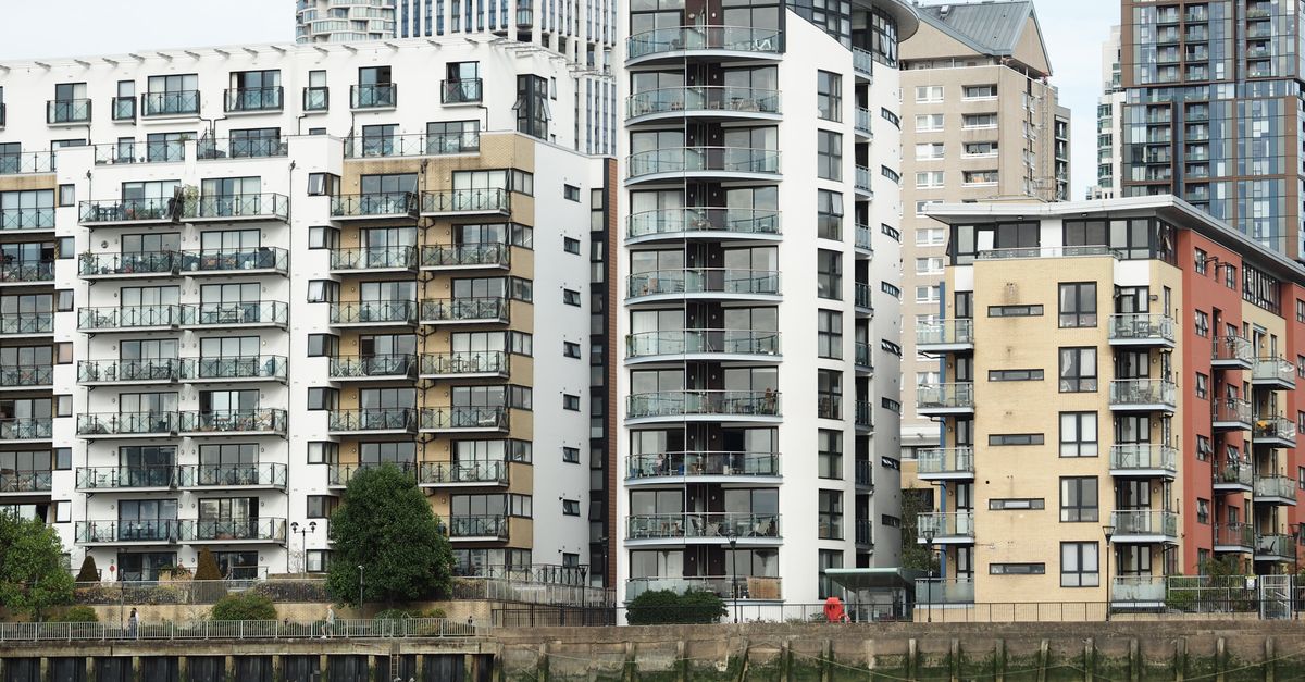 High-rise apartment buildings captured in an urban environment with modern architecture.