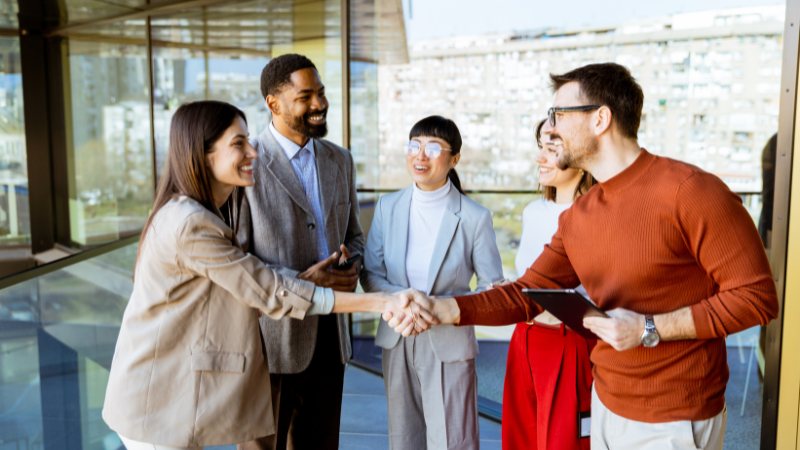 mulidiverse group shaking hands