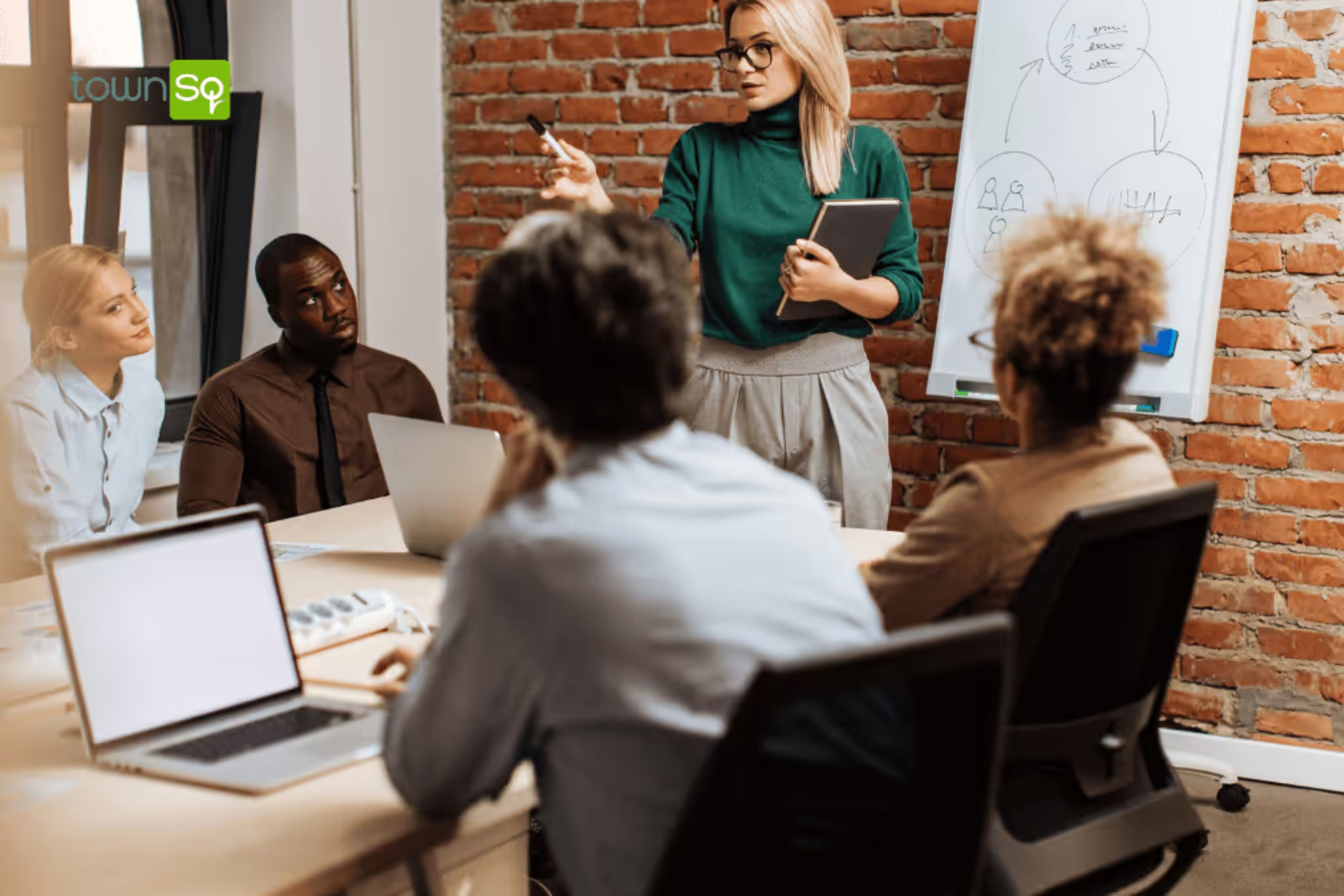 A property management board discusses strategies on how to best attract and retain clients.
