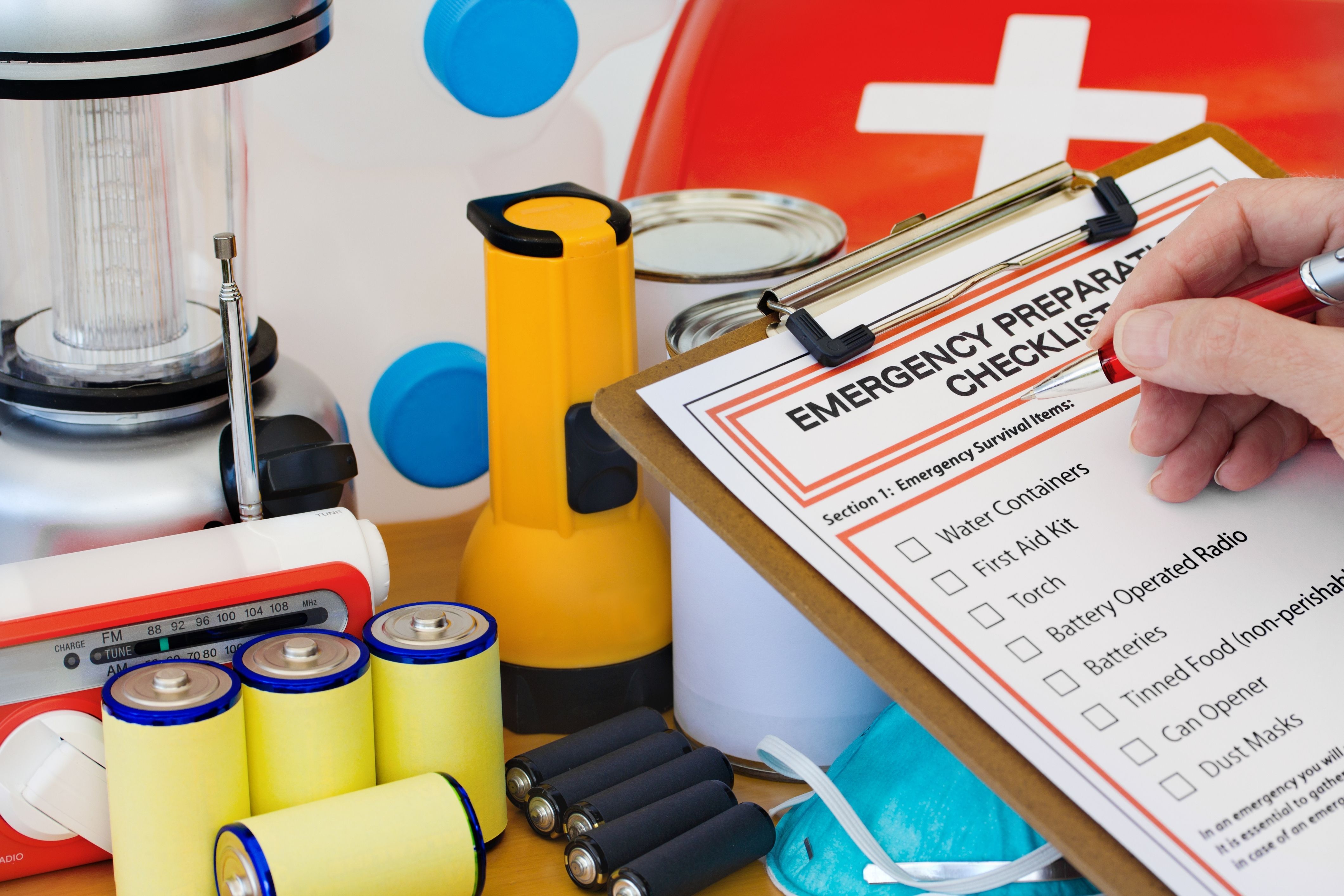 A property manager goes through a checklist while creating a disaster plan for their HOA community.