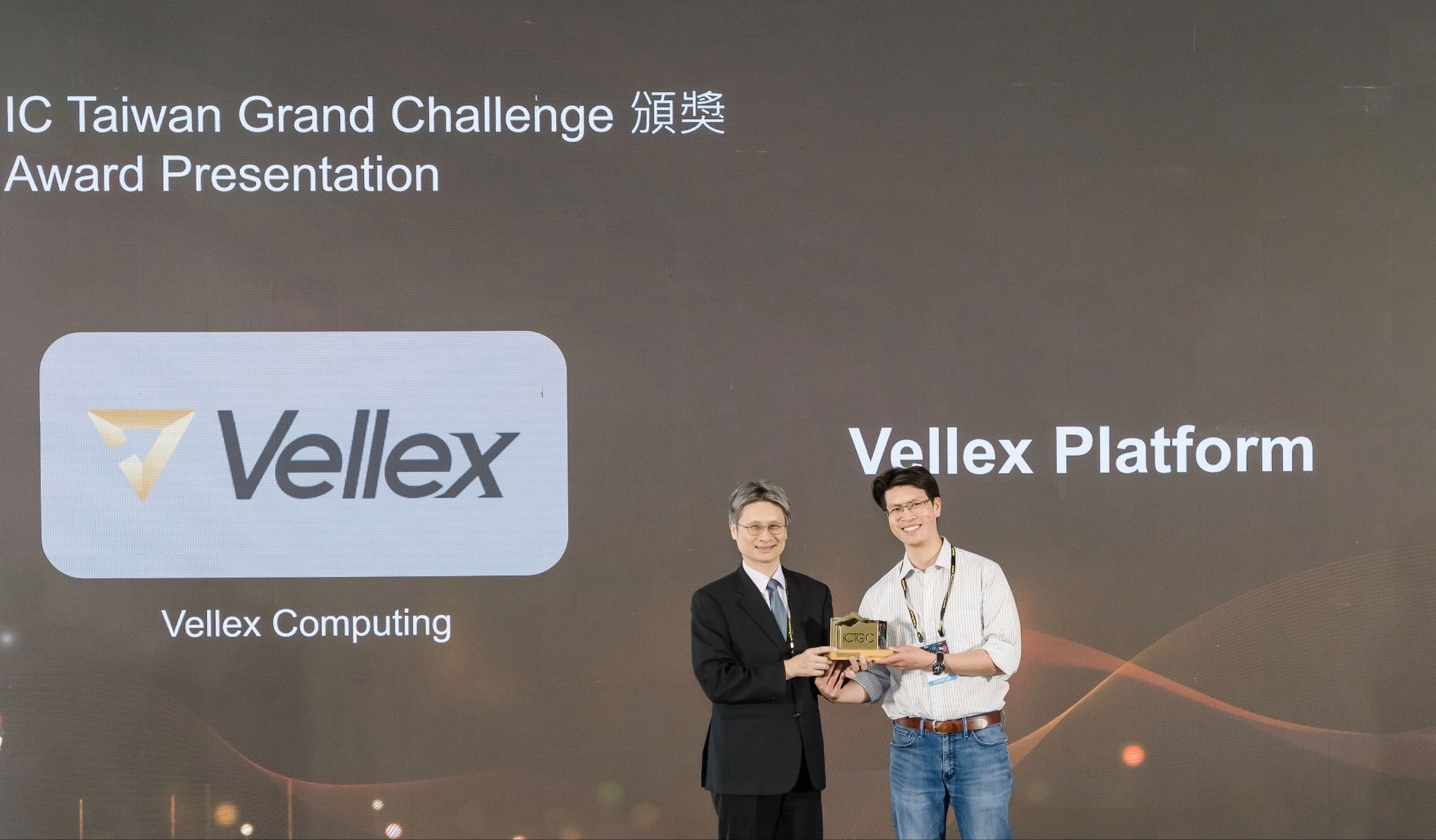 Vellex Computing Co-Founder Jason Poon accepting the award on stage during IC Taiwan Grand Challenge Award Ceremony & Unveil.