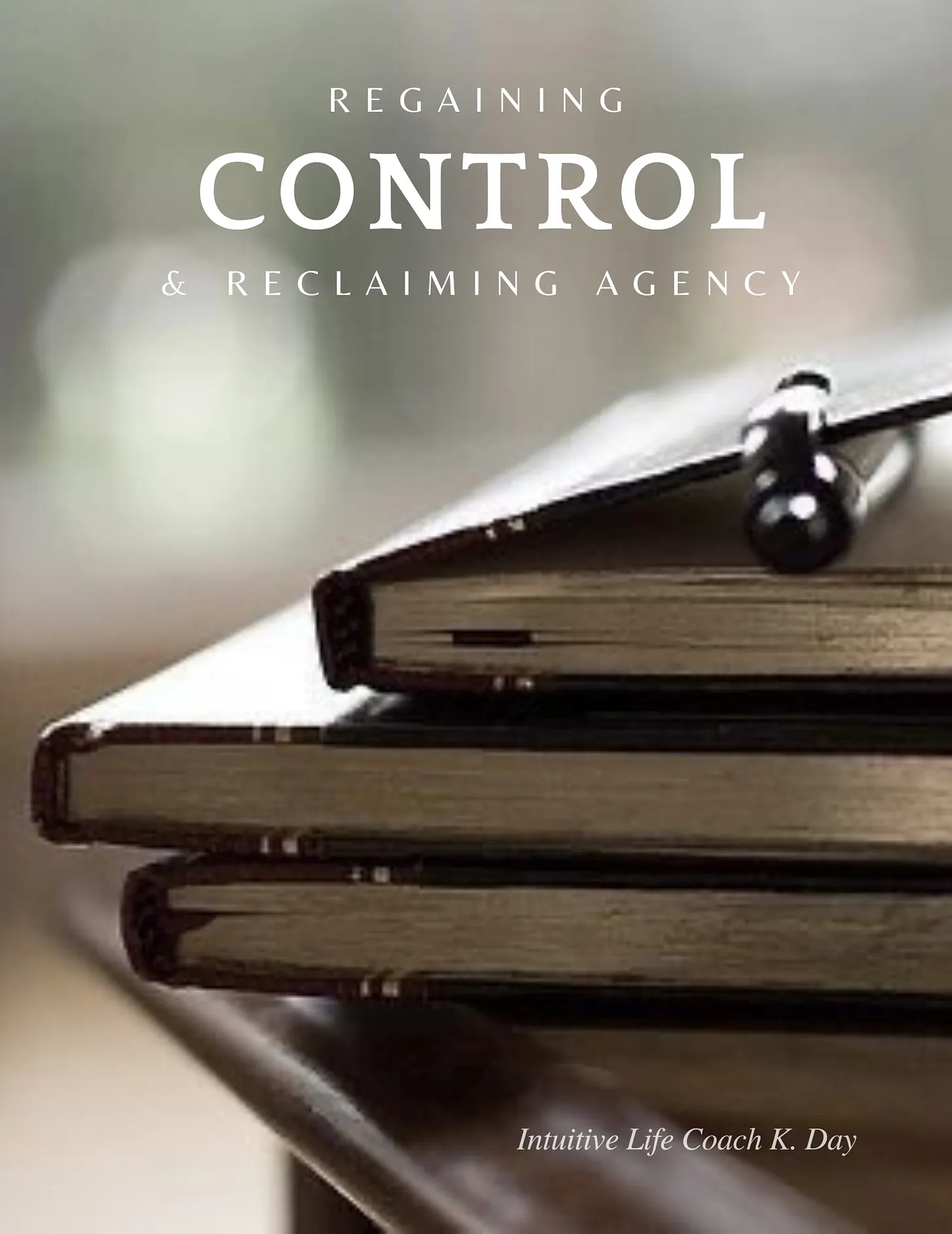 Stack of three journals on a table with a pen on top and the text 'Regaining Control & Reclaiming Agency'.