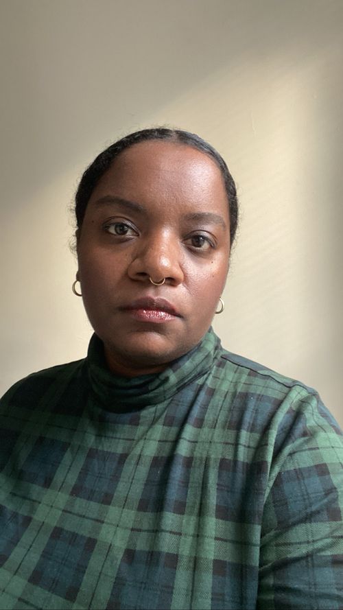 Headshot of Alicia, owner of Rare Form Astrology