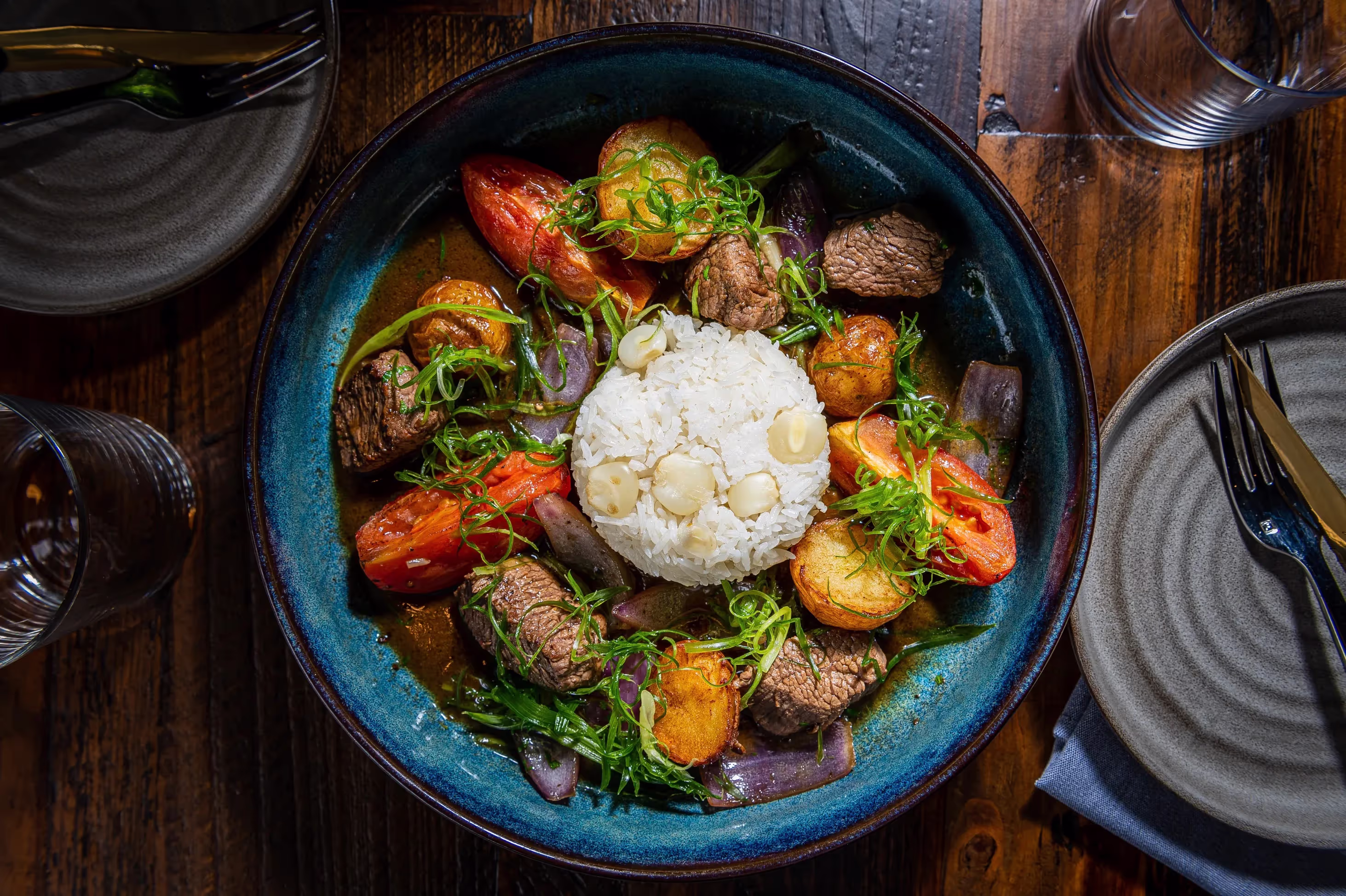 Lomo Saltado with rice and vegetables