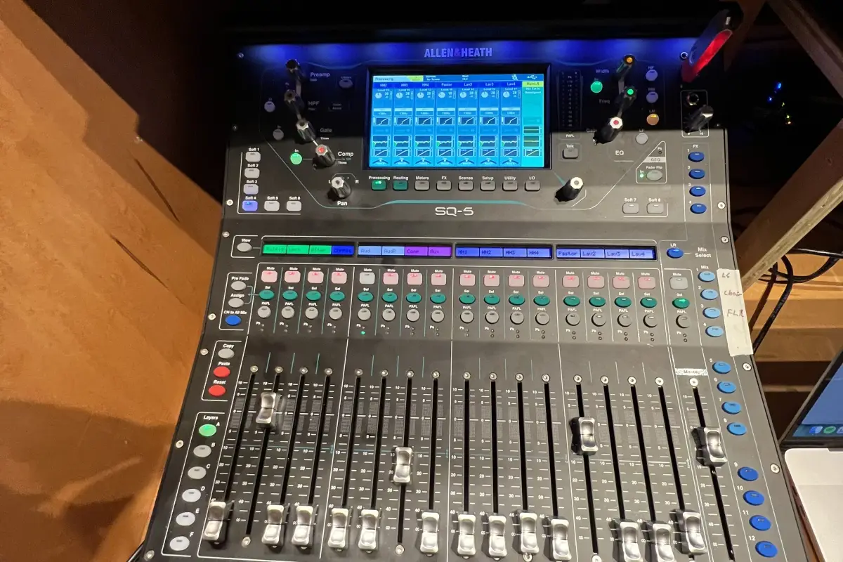 View from church tech booth over an Allen & Heath SQ-7 mixer toward the congregation below