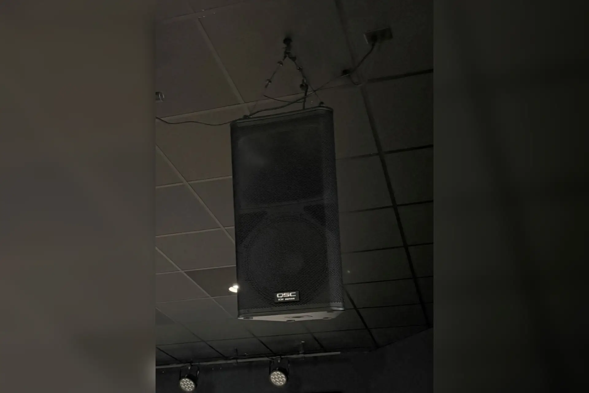 QSC speaker installed over a church stage