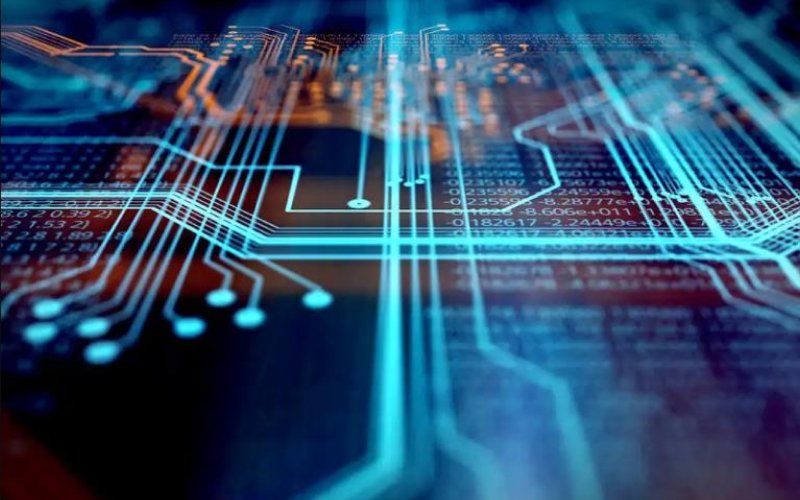 Close-up of a glowing blue circuit board with numeric data overlay on a dark background.