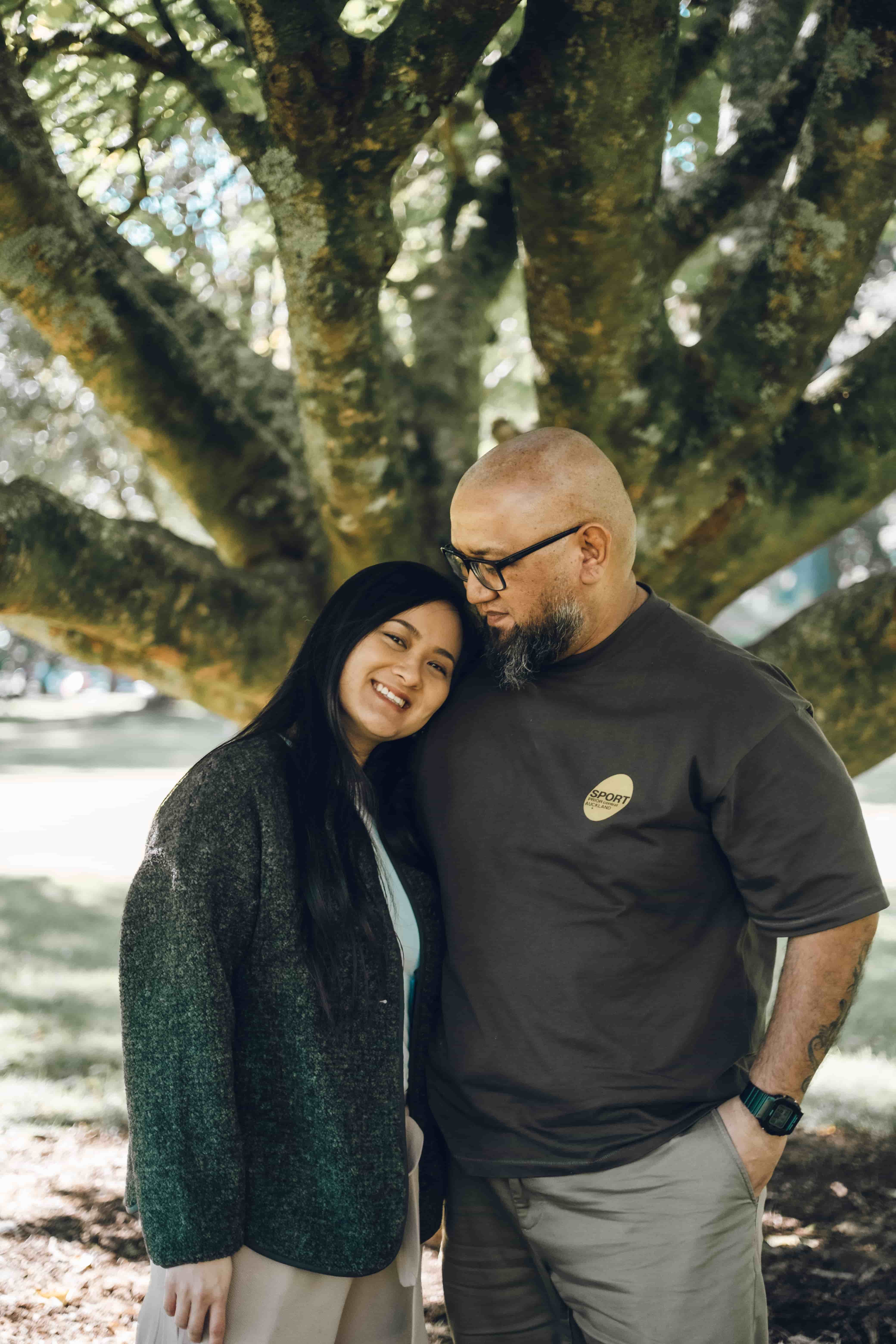 Woman resting her head on her husband's shoulder