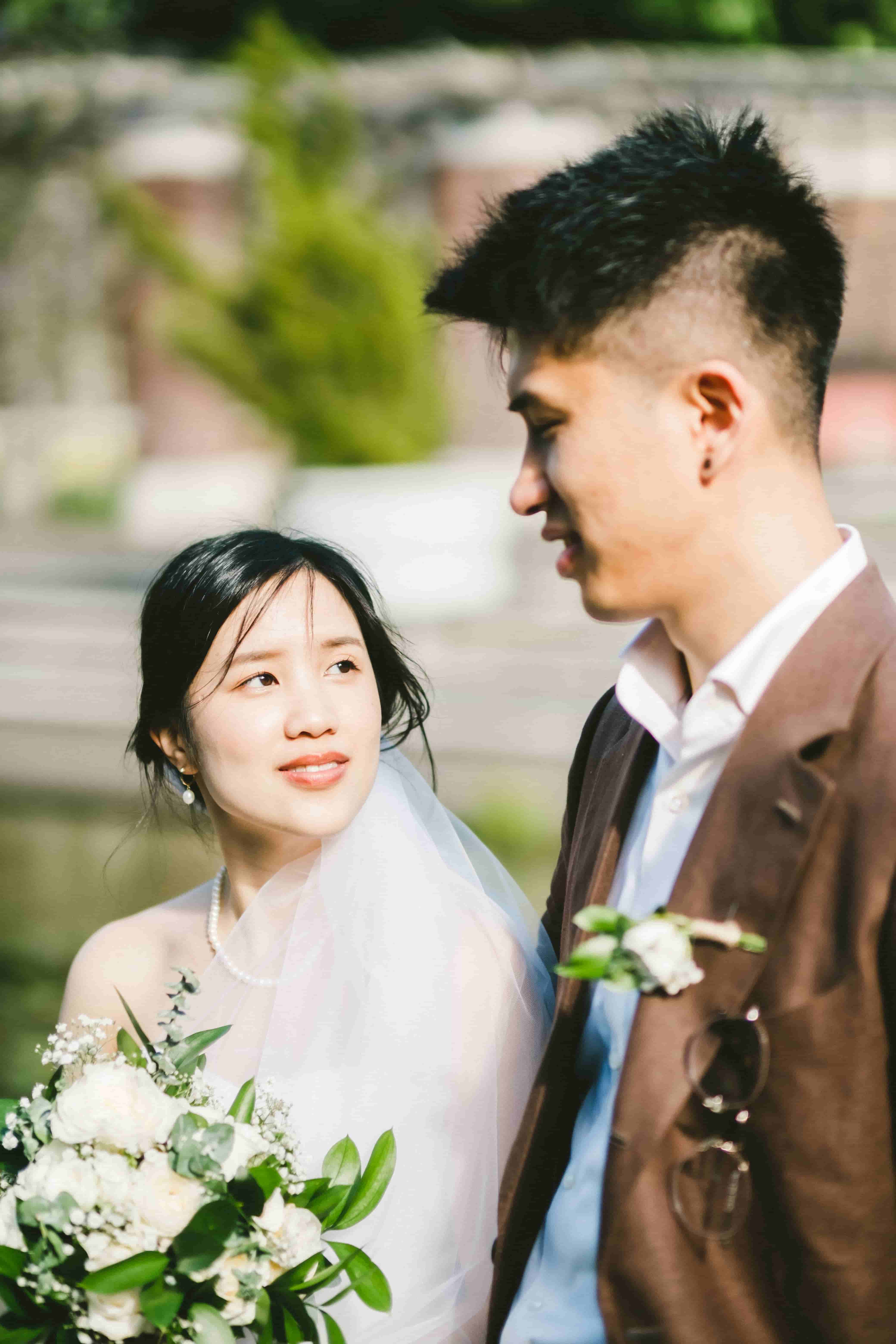 Close portrait of Sam and May in soft garden light