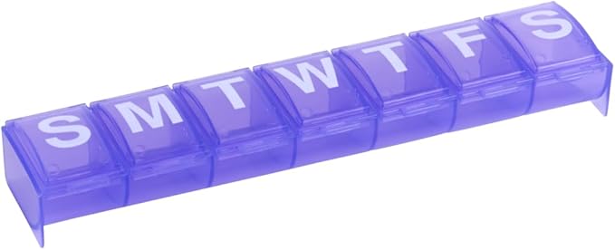Weekly pill organizer with seven purple compartments labeled S to S, designed to help seniors manage daily medications and improve adherence.