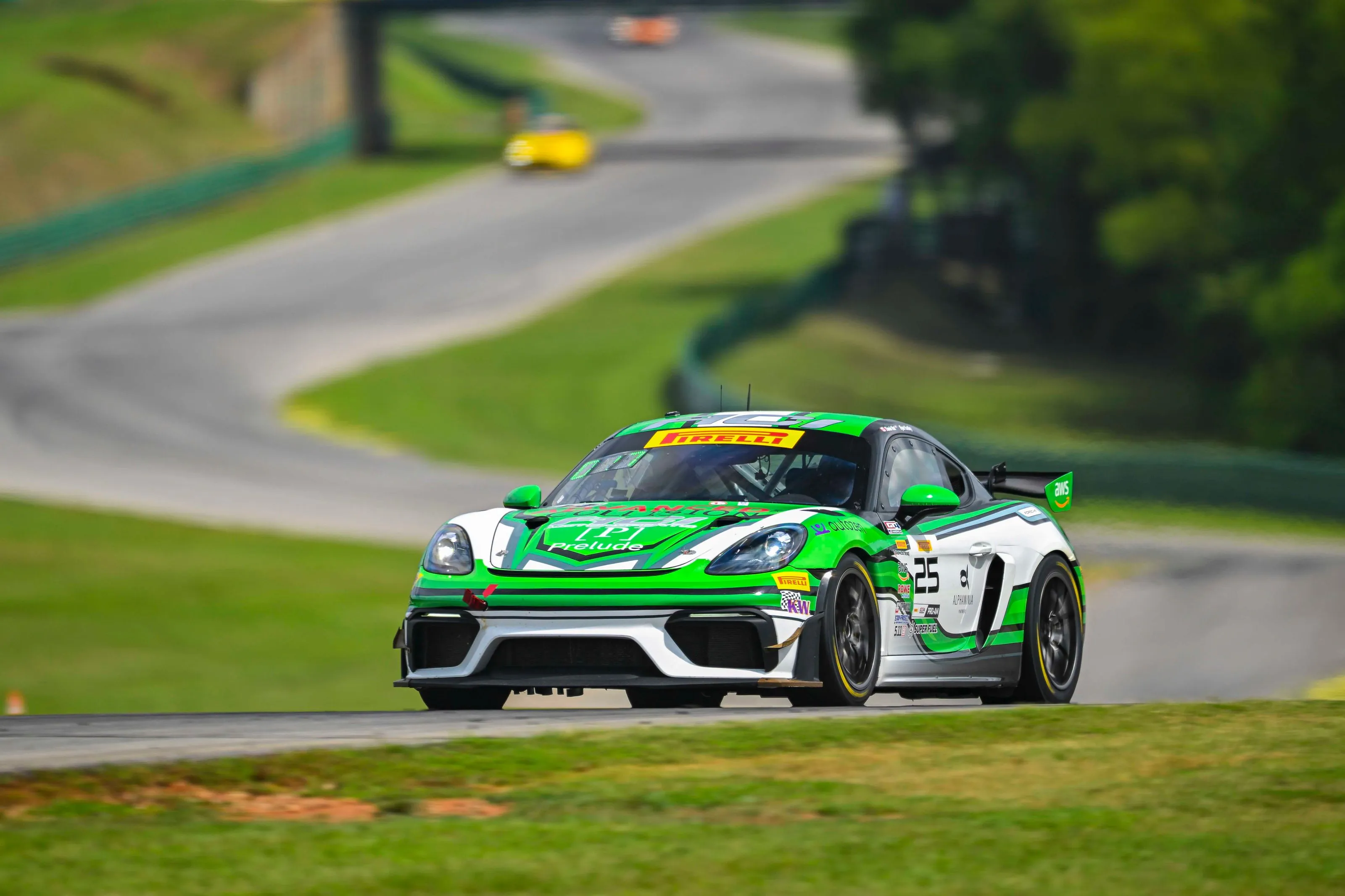 ACI Motorsports Porsche 718 Cayman GT4 race car on track at Road Atlanta during a Pirelli GT4 America race