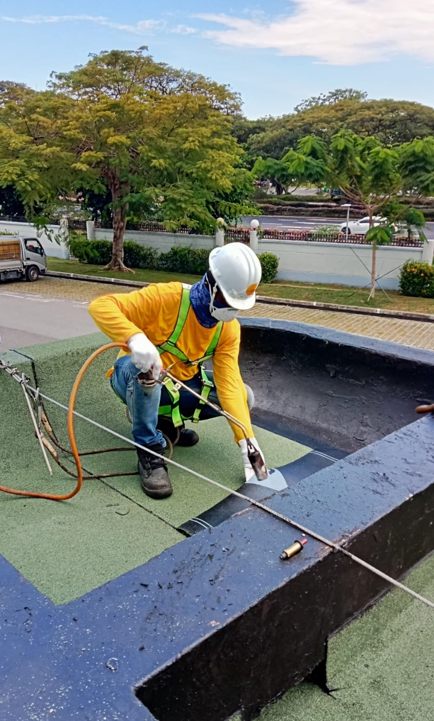 Waterproofing Specialist doing Torch on Membrane