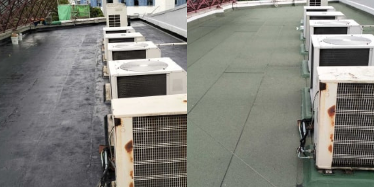 Close-up of a red tiled roof with visible cracks and sealant applied along the tile edges indicating roof repair, water leakage issues