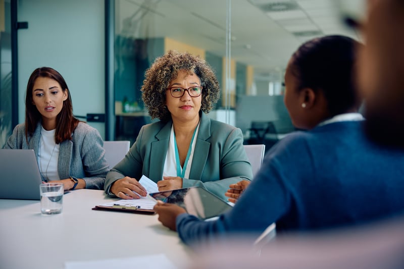 Nonprofit leaders meeting during an executive transition