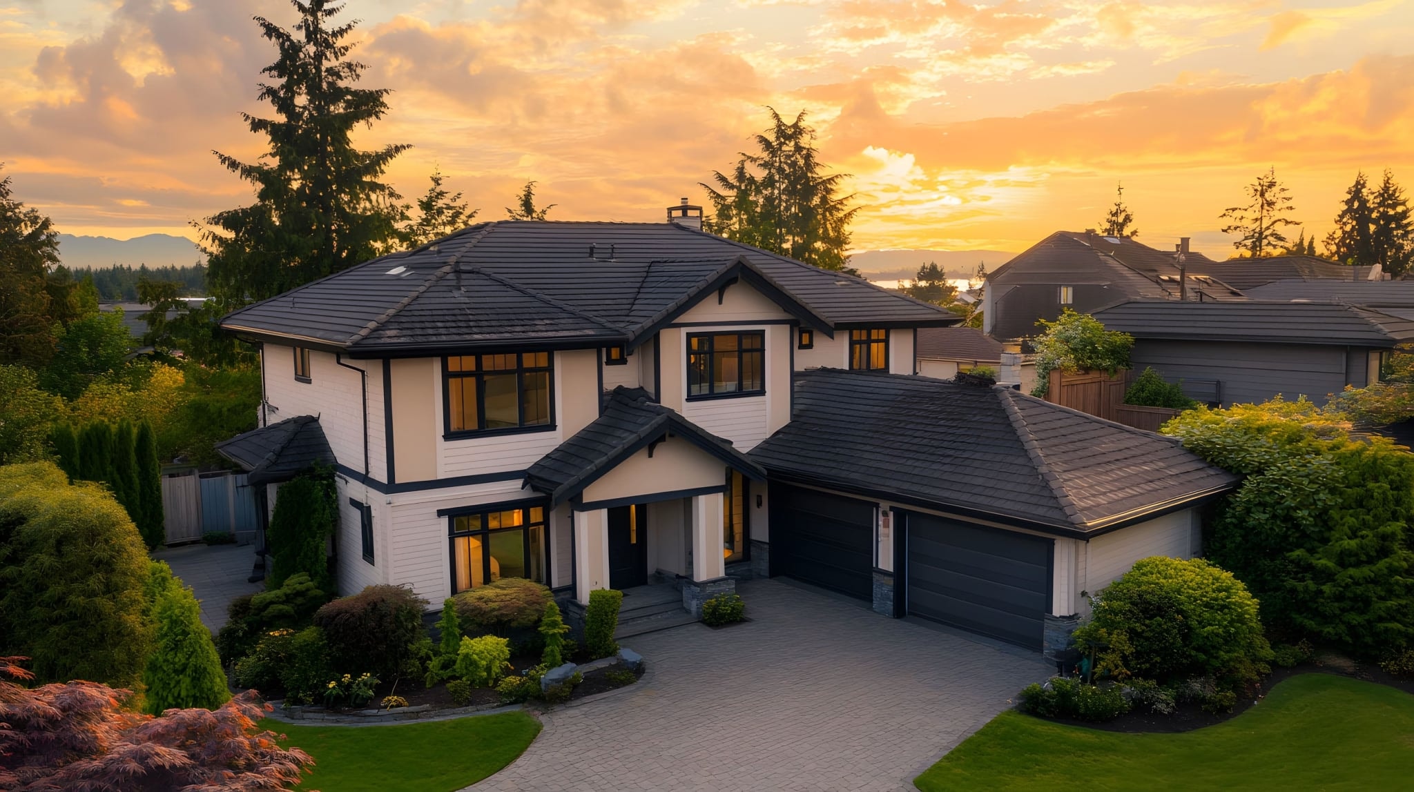 Luxury home sunset aerial view