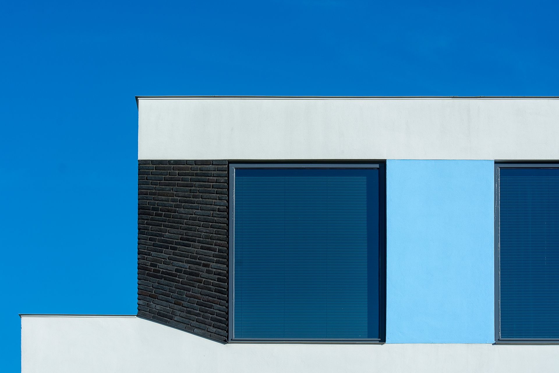 flat roof building blue sky
