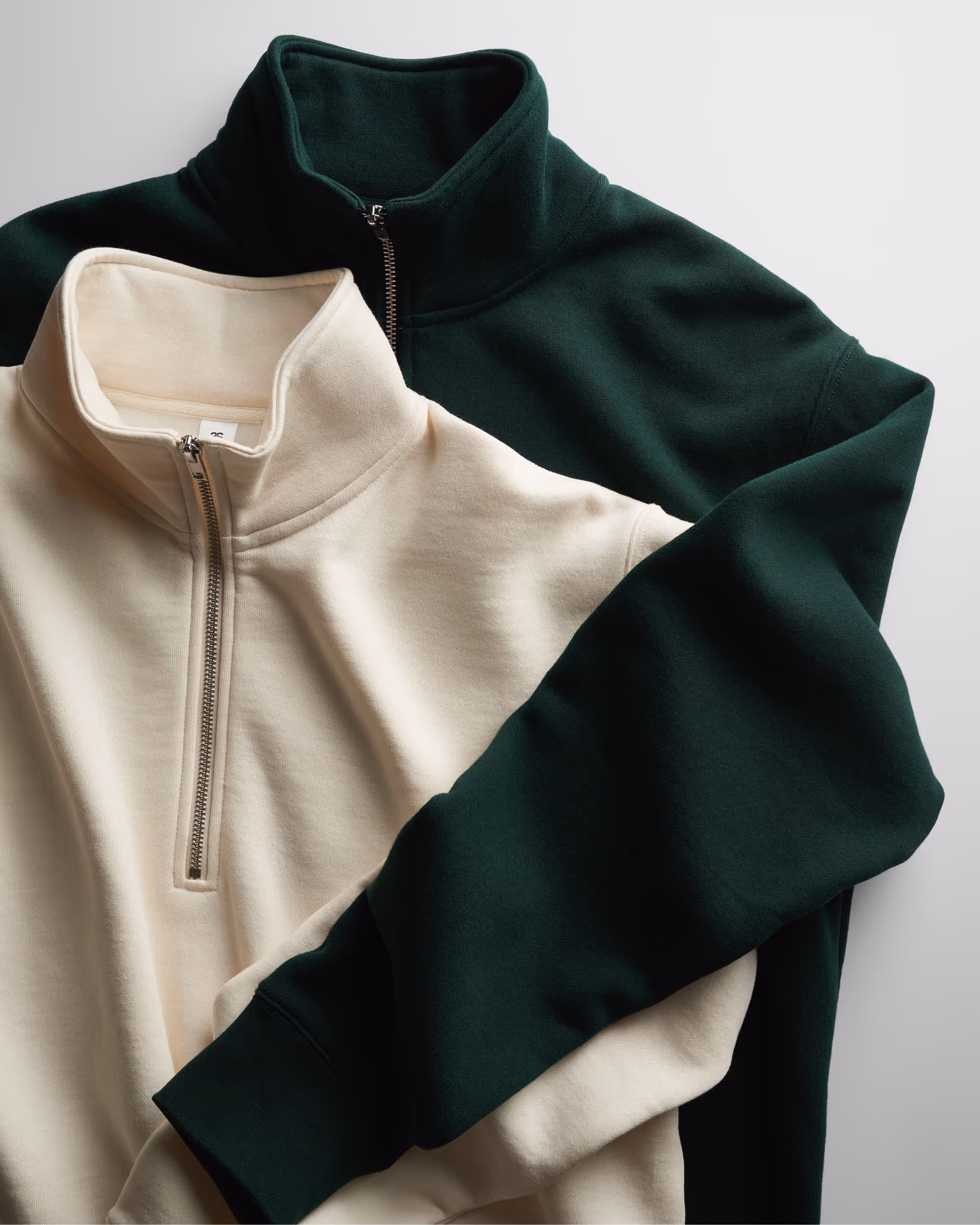 5125_HALF_ZIP_GROUP_FLATLAY.jpg