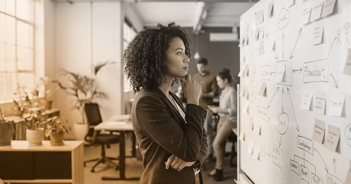 A man standing in front of a compass.