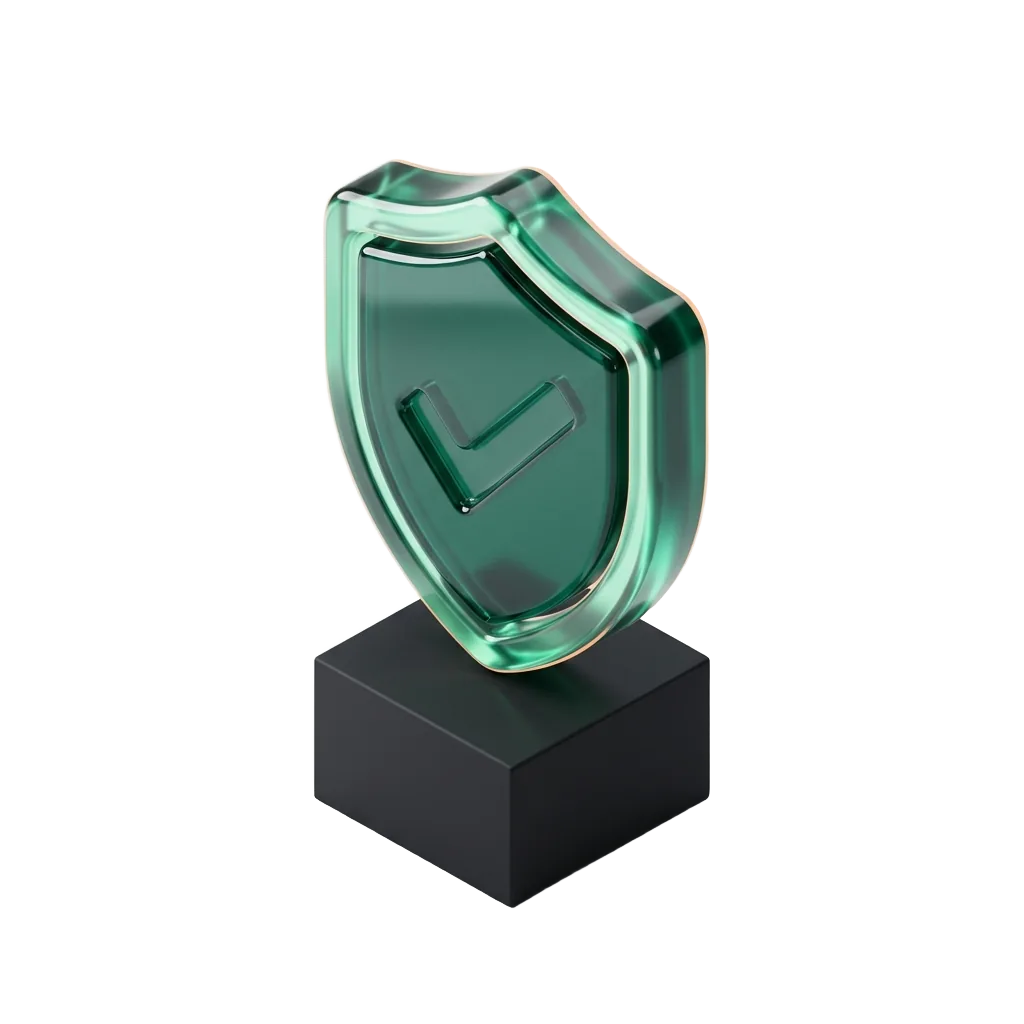 Emerald glass shield with a check mark on a black pedestal, chosen over the practice down the road