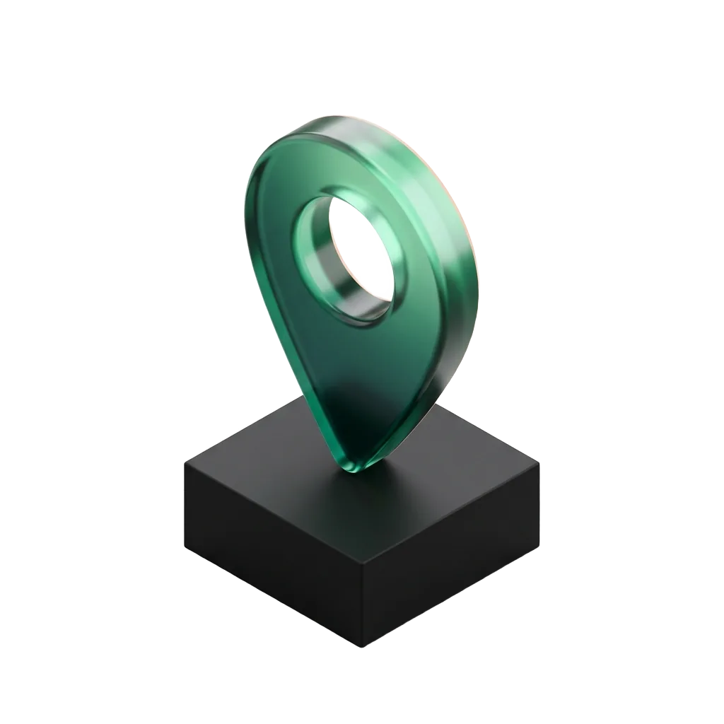 Emerald glass map pin on a black pedestal, found for the eye exam and the procedure