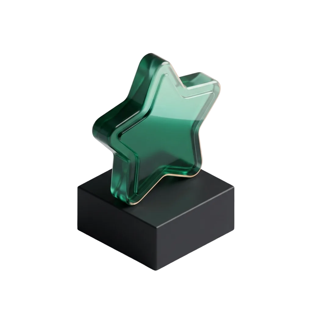 Emerald glass star medallion on a black pedestal, chosen over the two other names on her list