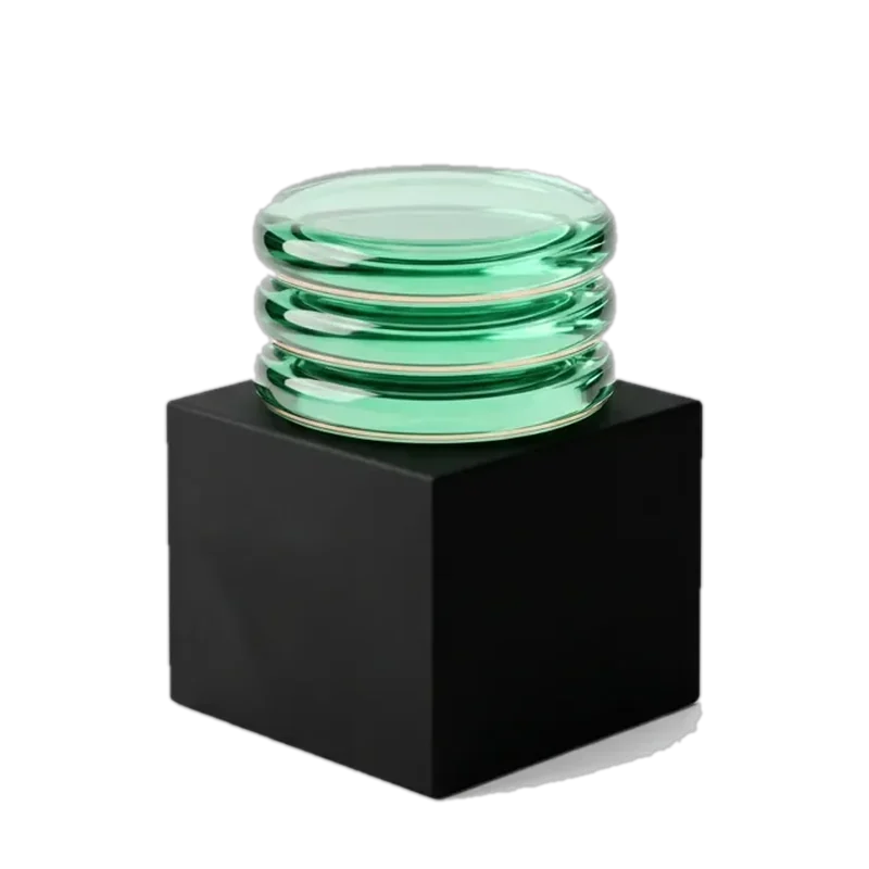 Green glass stacked layers on a black base