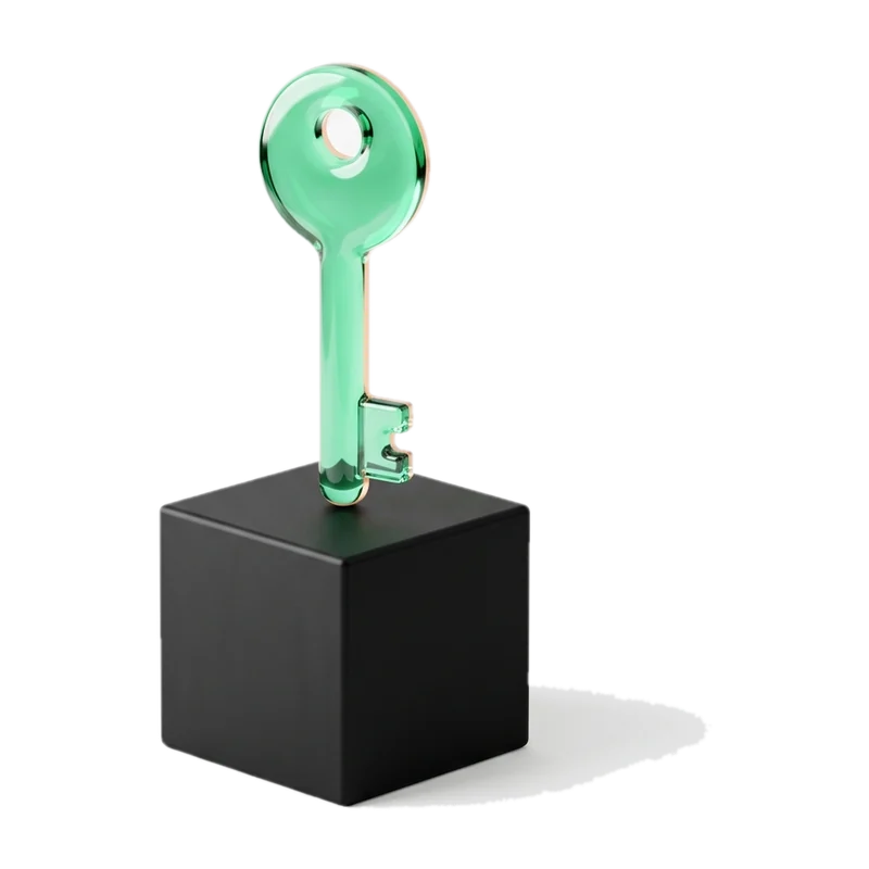 Green glass key on a black base