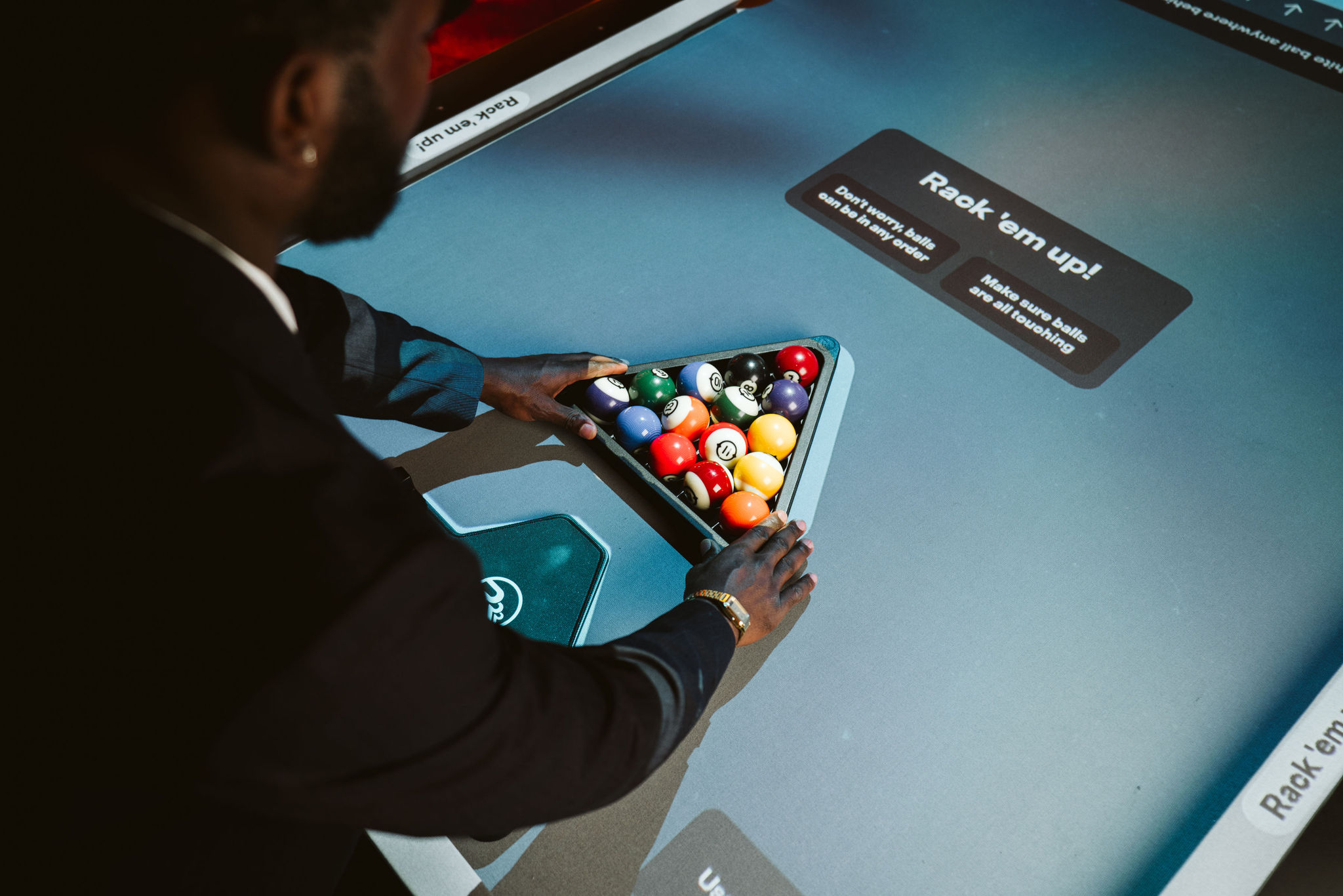 A Poolhouse table under the lights