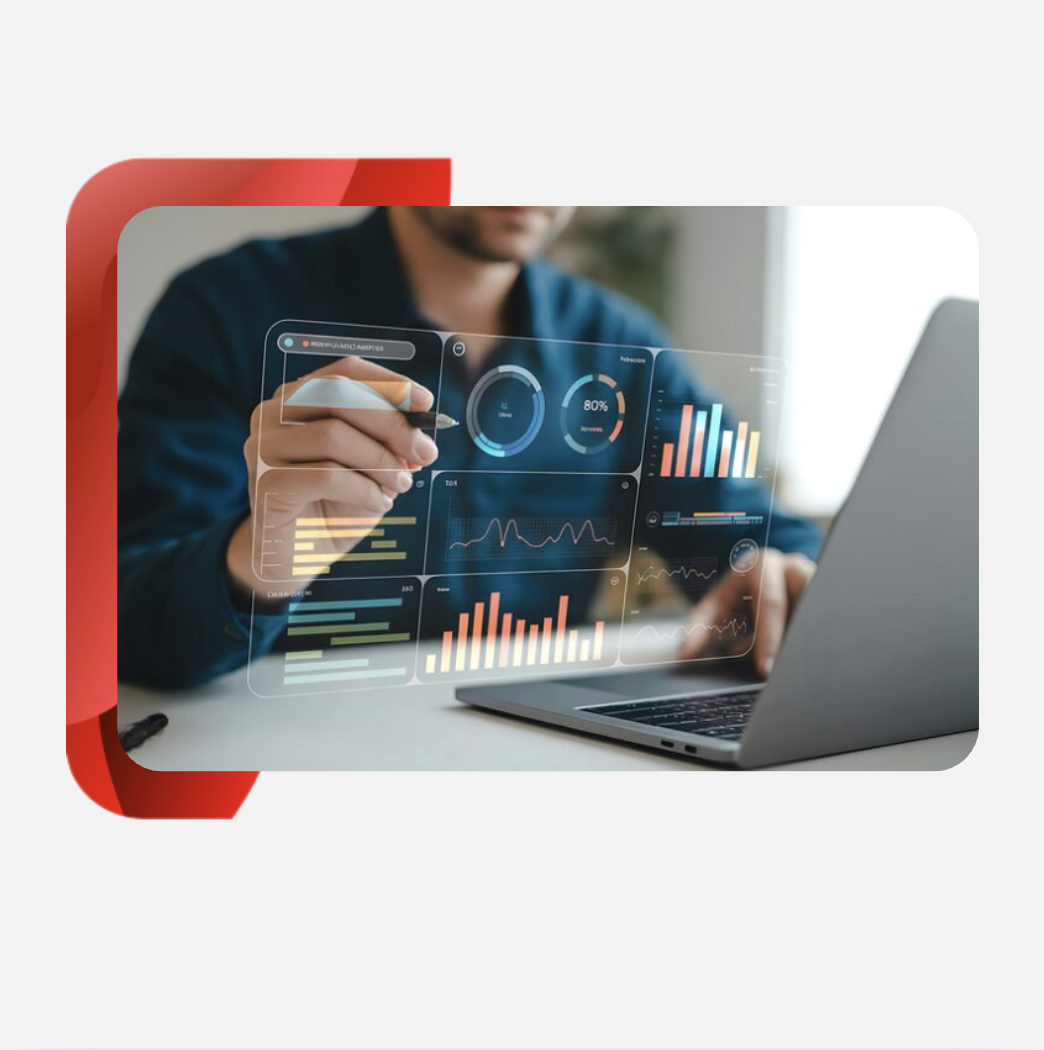 A professional analyzing business data on a laptop 
i
