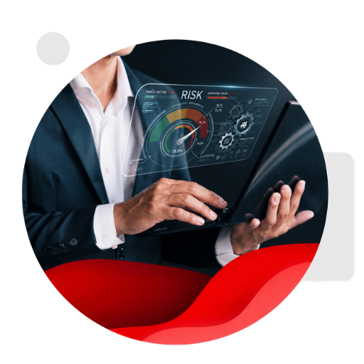 A person in a suit using a laptop that displays a holographic dashboard with a risk meter for risk management