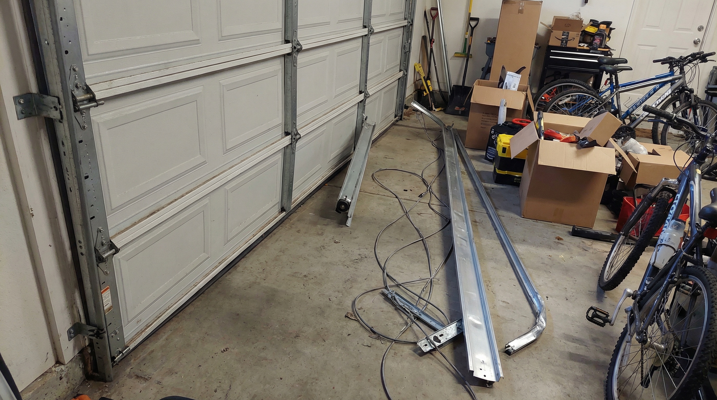 Garage Door tuneups require track and roller lubrication. Homes in Philadelphia should get a garage door tune up regularly.