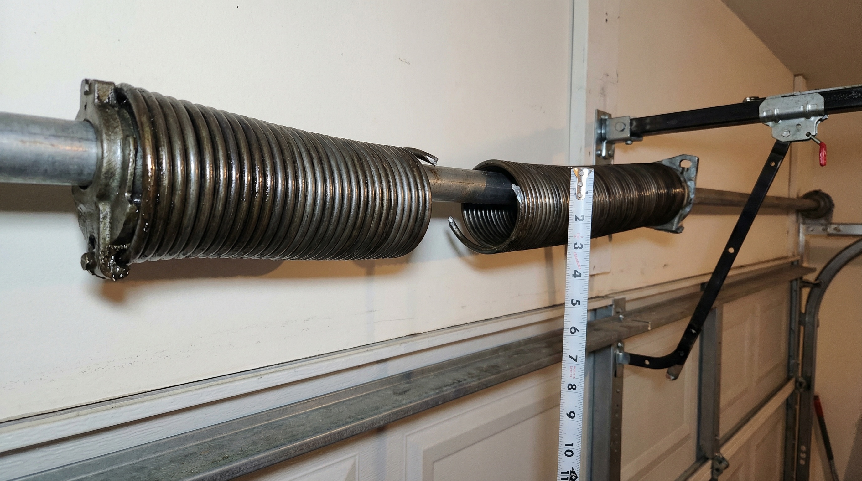 Garage Door tuneups require track and roller lubrication. Homes in Philadelphia should get a garage door tune up regularly.