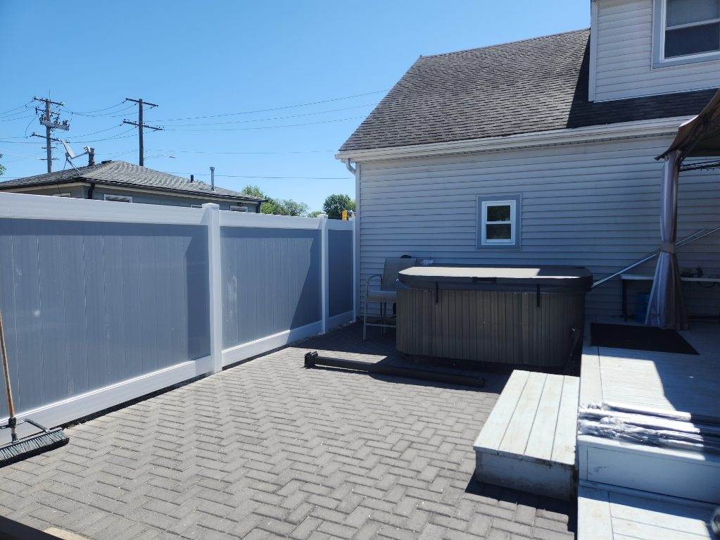 Bana Landscaping's Team Installs Gray Holland Stone Paver Patio In Backyard