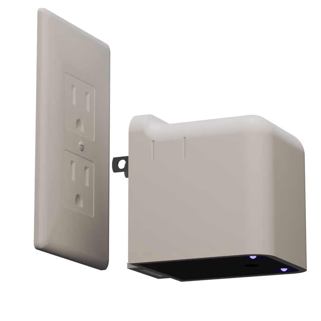 A standard wall plug and a Scorpion Detector about to be plugged in.