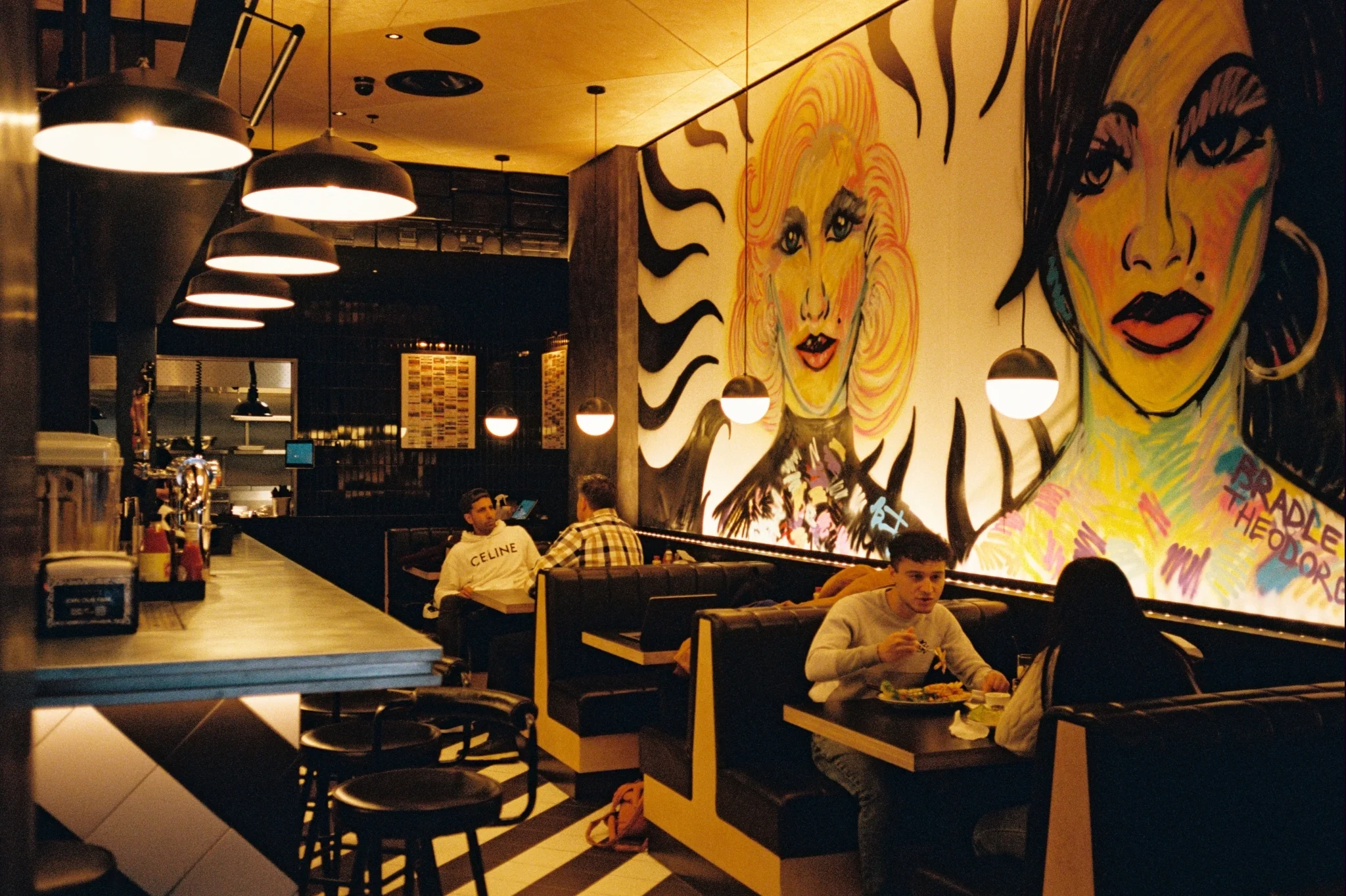 Restaurant diners eating at Black Tap