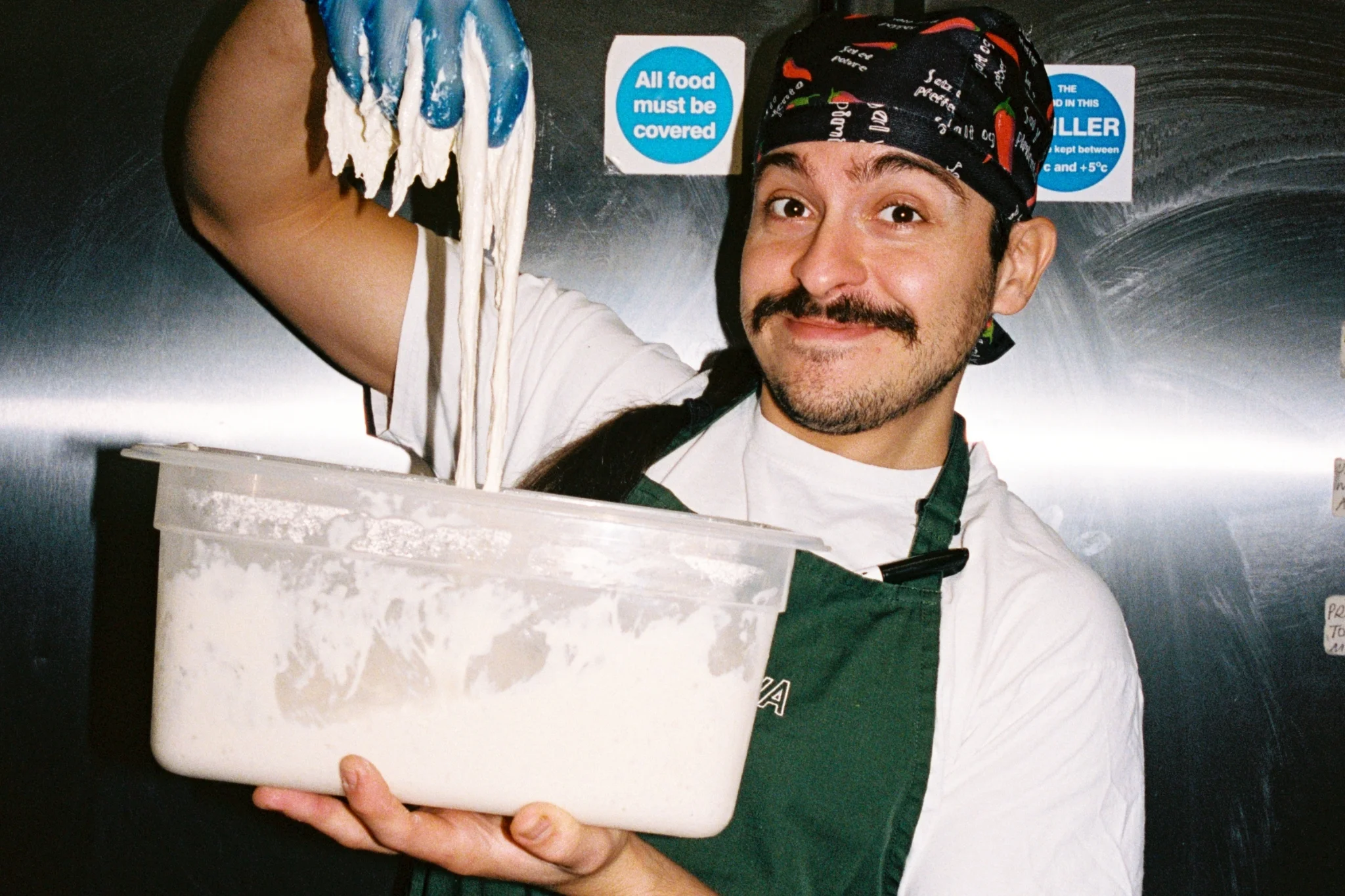  Chef holding ready-made dough