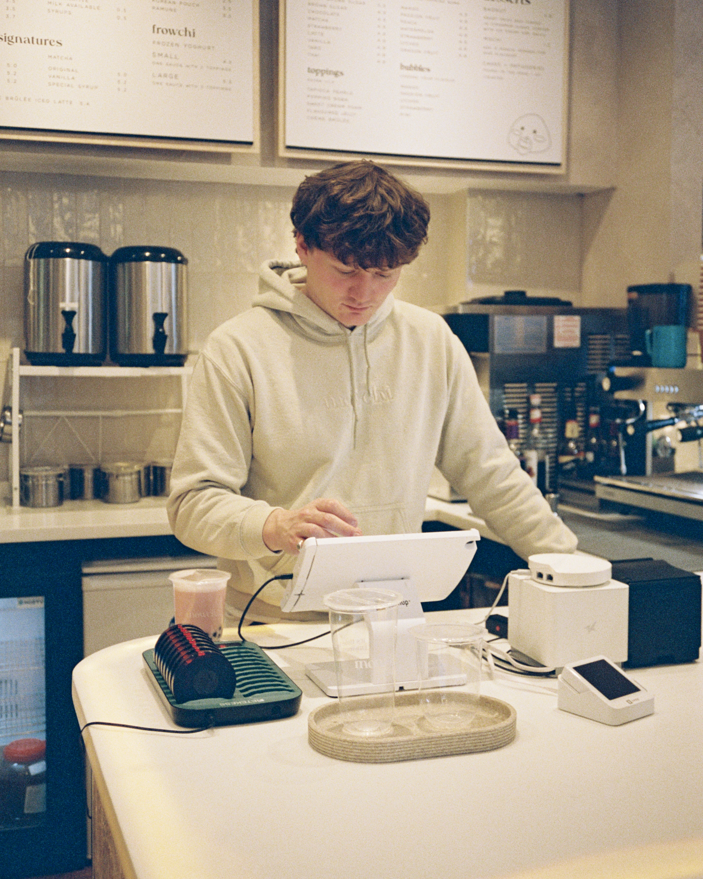 UK hospitality employee working behind the counter