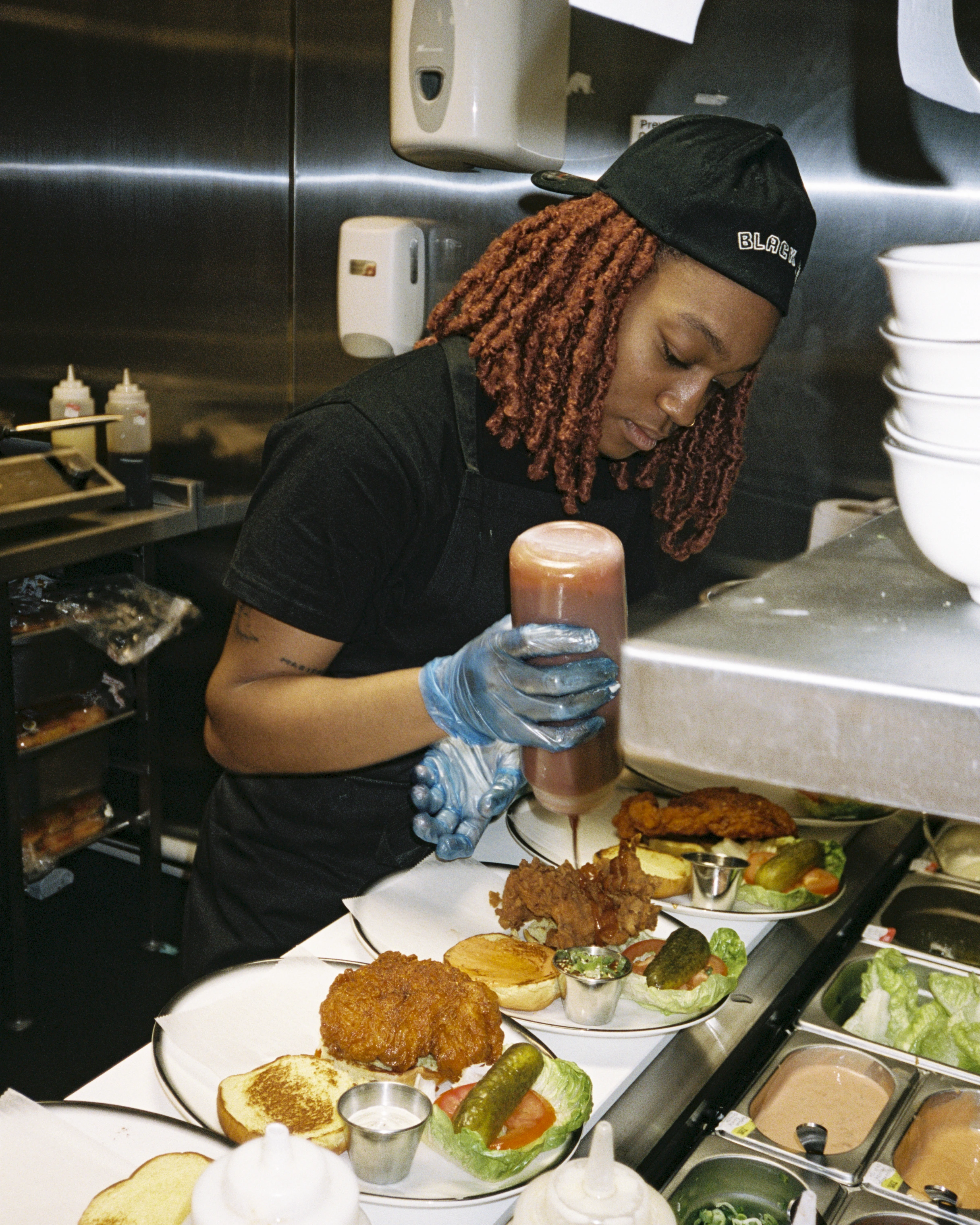 restaurant employee preparing food in the kitchen