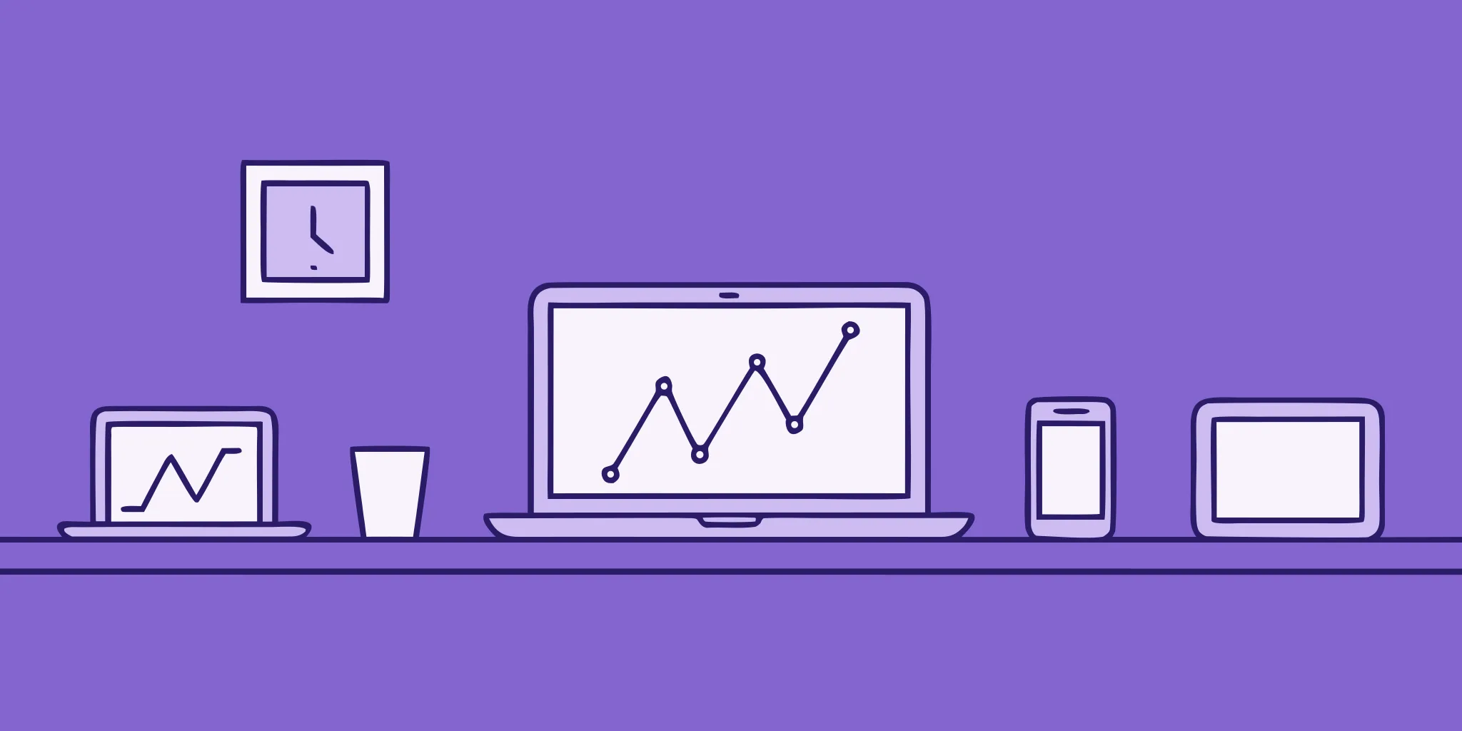 Laptops and charts showing business growth from using enterprise RFP automation solutions.