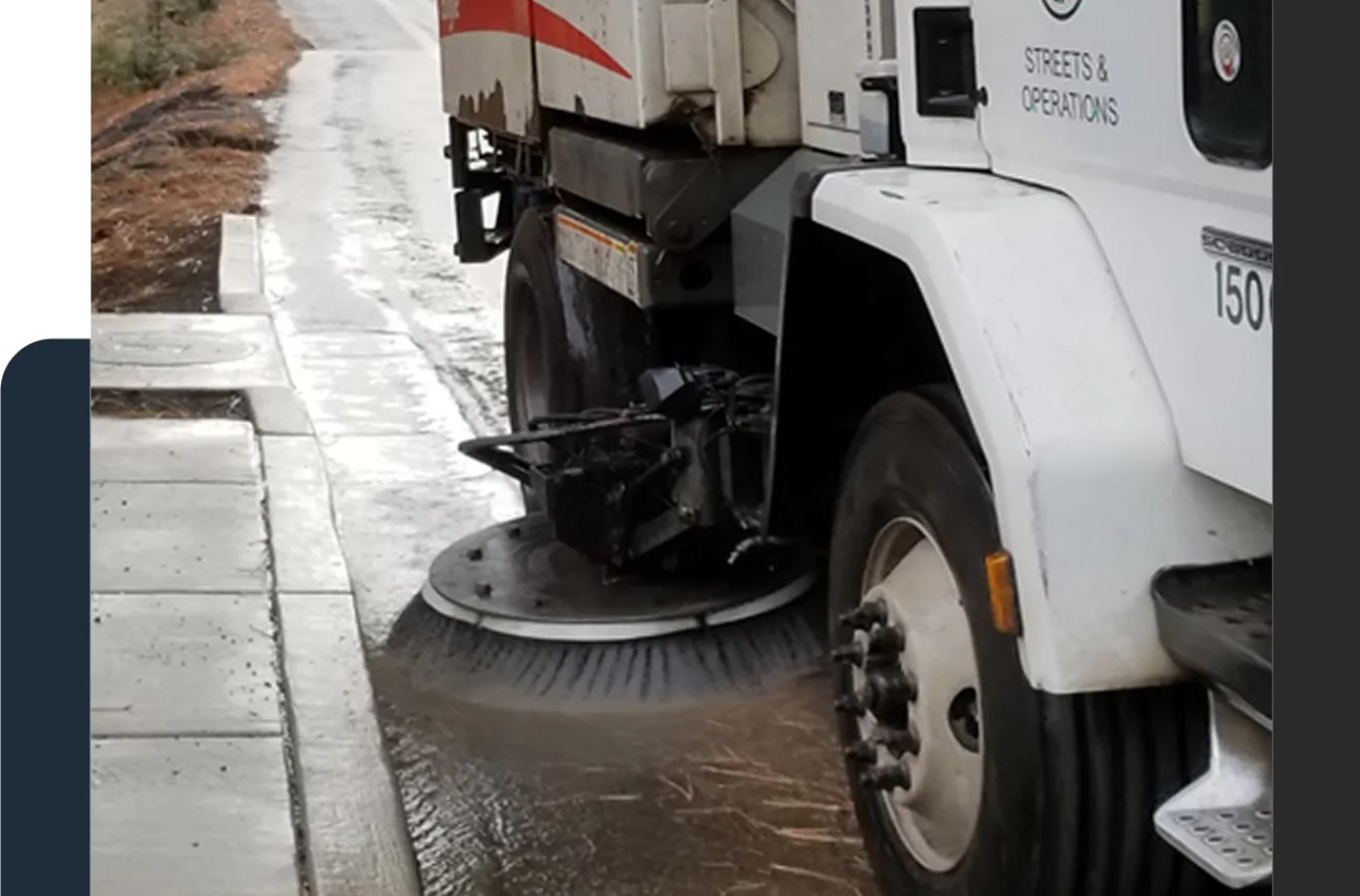 A Sundance Sweeping crew delivering Street Sweeper in Peoria, AZ, removing debris to keep roads and lots clean, safe.