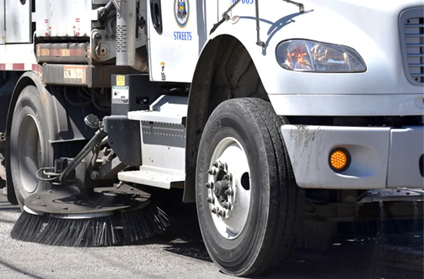 A Sundance Sweeping crew conducting parking lot sweeping in El Mirage, AZ, showcasing trusted service and reliable local expertise. Parking Lot Sweeping near me.