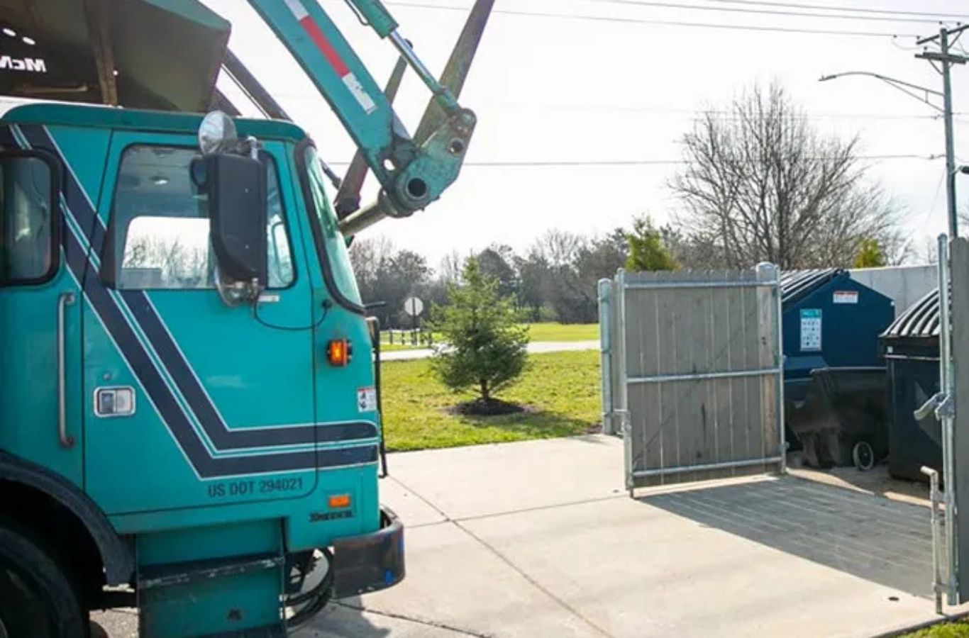 A Sundance Sweeping technician conducting parking lot sweeping in Glendale, AZ, maintaining clean, safe, and attractive commercial lots.